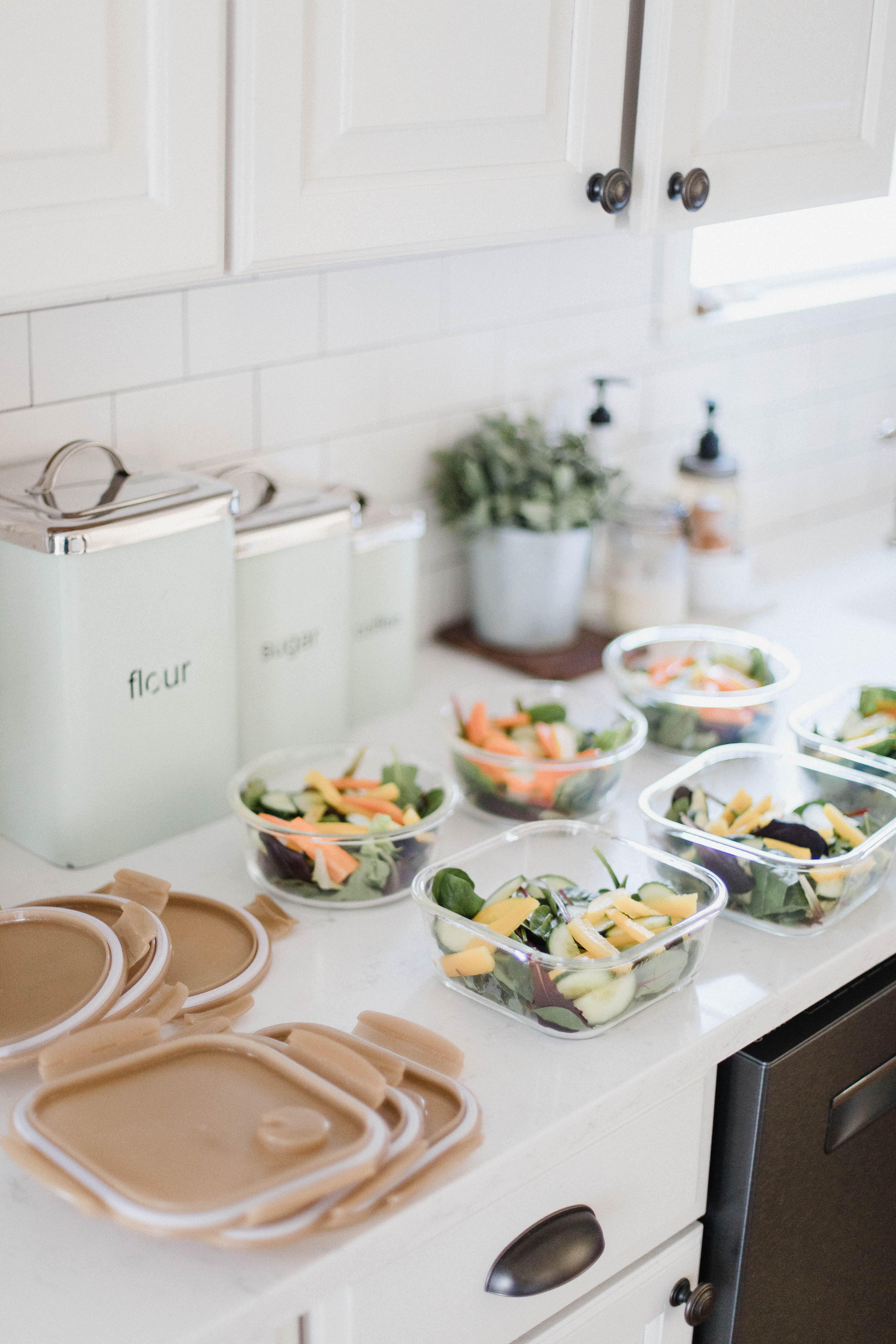 Connecticut life and style blogger Lauren McBride shares her fitness essentials for the new year, including wireless headphones, meal prepping containers, and a fitness tracker.