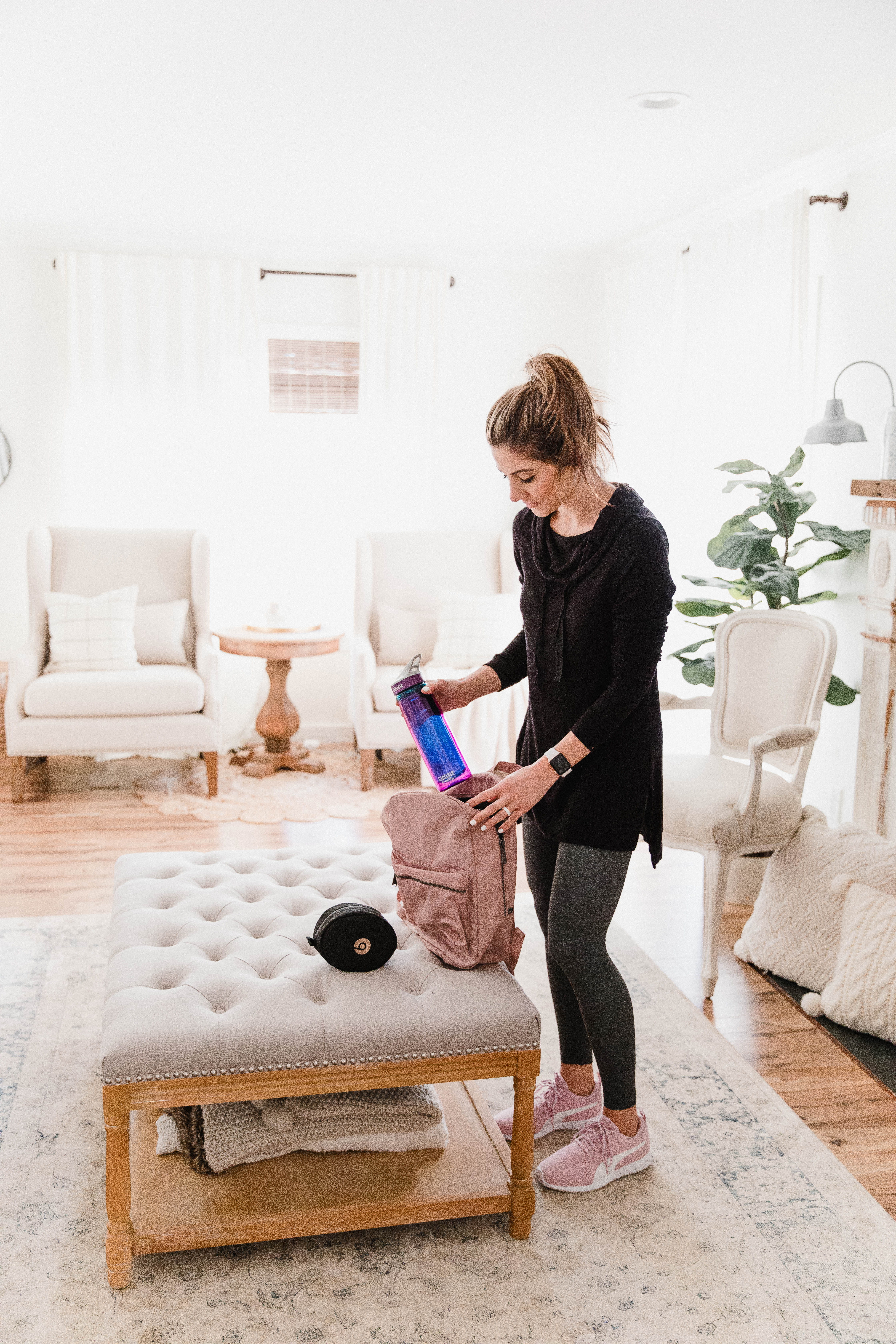 Connecticut life and style blogger Lauren McBride shares her fitness essentials for the new year, including wireless headphones, meal prepping containers, and a fitness tracker.