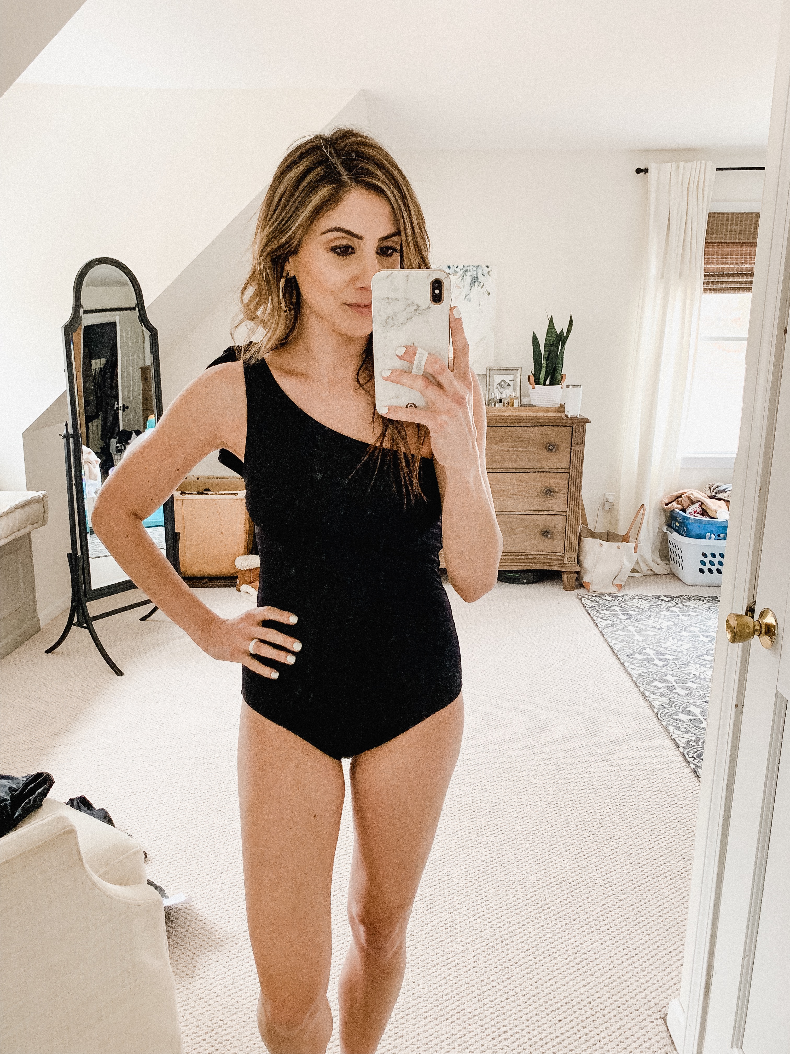 Connecticut life and style blogger Lauren McBride shares The Best Modest Swimwear, featuring a variety of bathing suit that provide modest coverage.