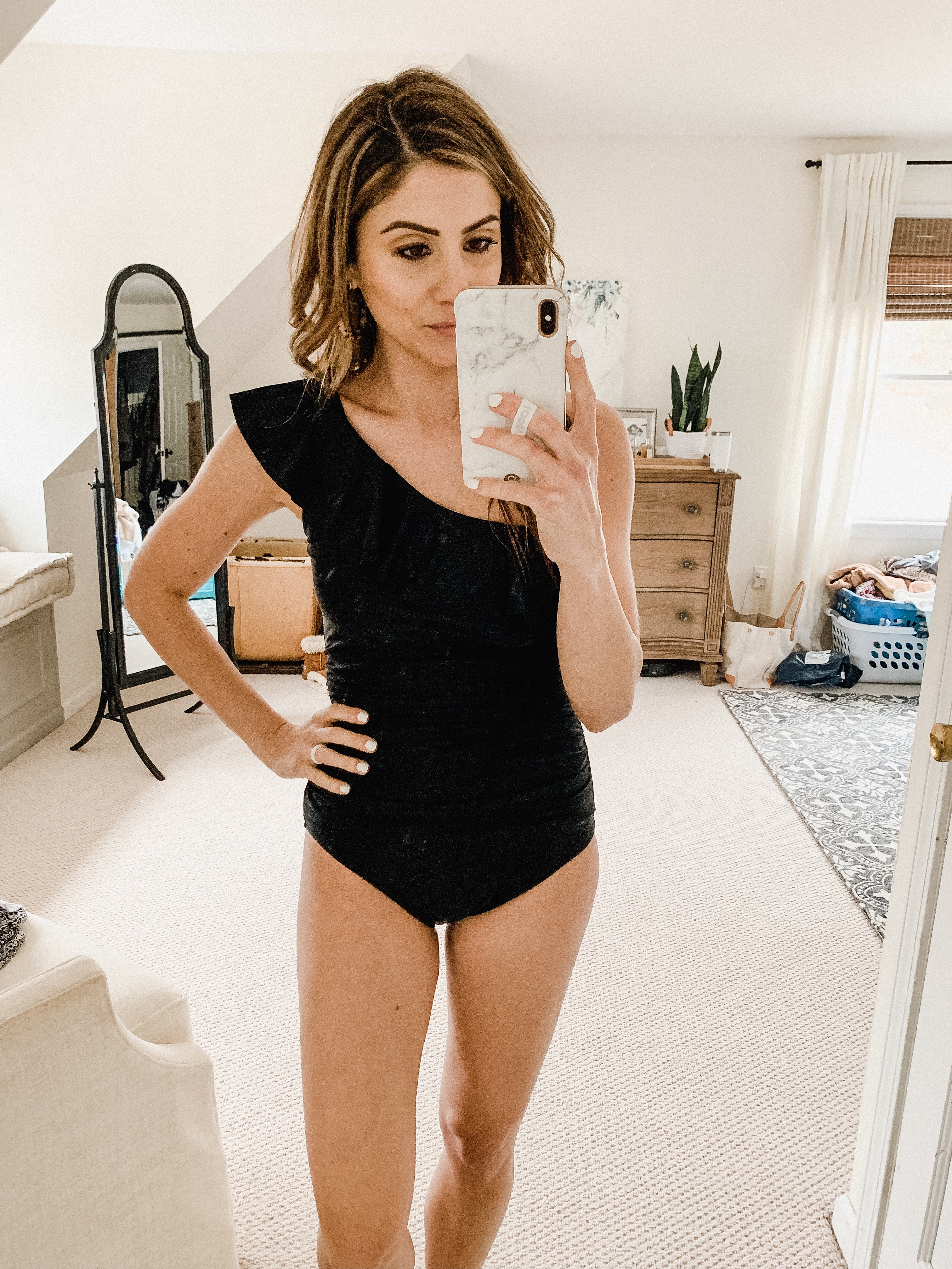 Connecticut life and style blogger Lauren McBride shares The Best Modest Swimwear, featuring a variety of bathing suit that provide modest coverage.