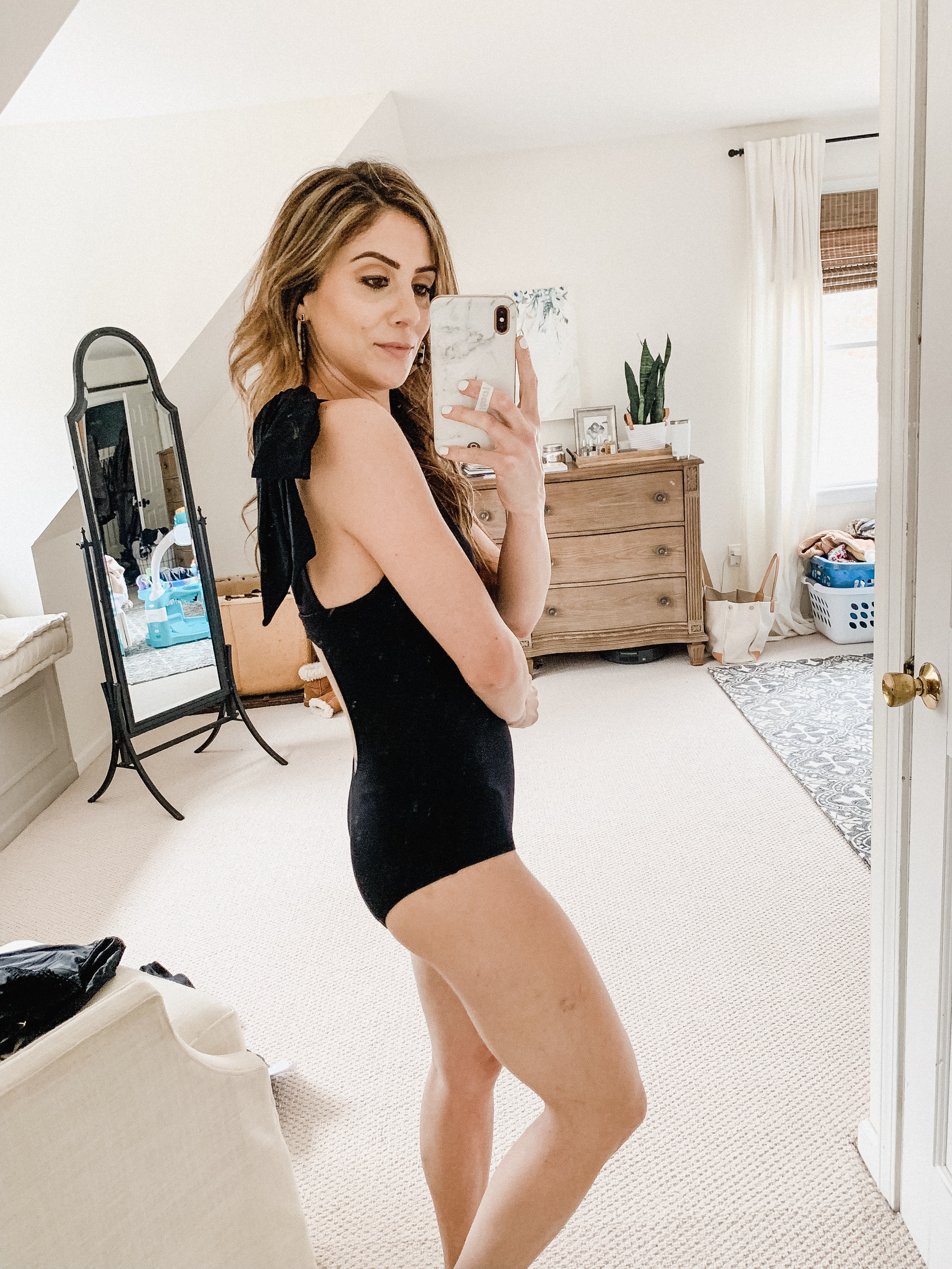 Connecticut life and style blogger Lauren McBride shares The Best Modest Swimwear, featuring a variety of bathing suit that provide modest coverage.