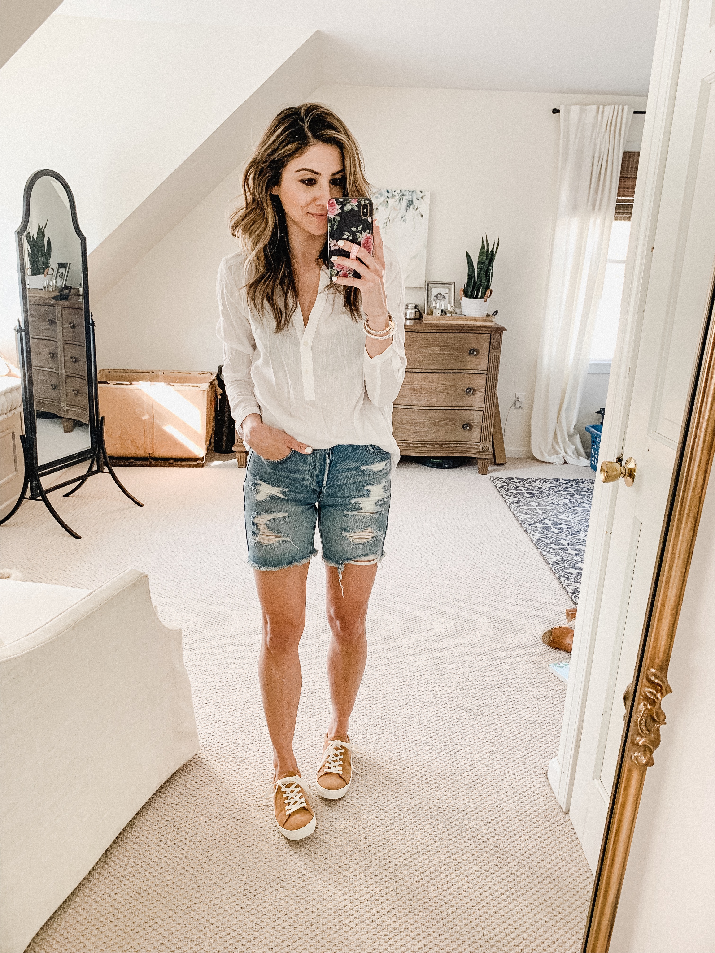 Connecticut life and style blogger Lauren McBride shares How to Style Bermuda Shorts including outfit ideas and styling tips.