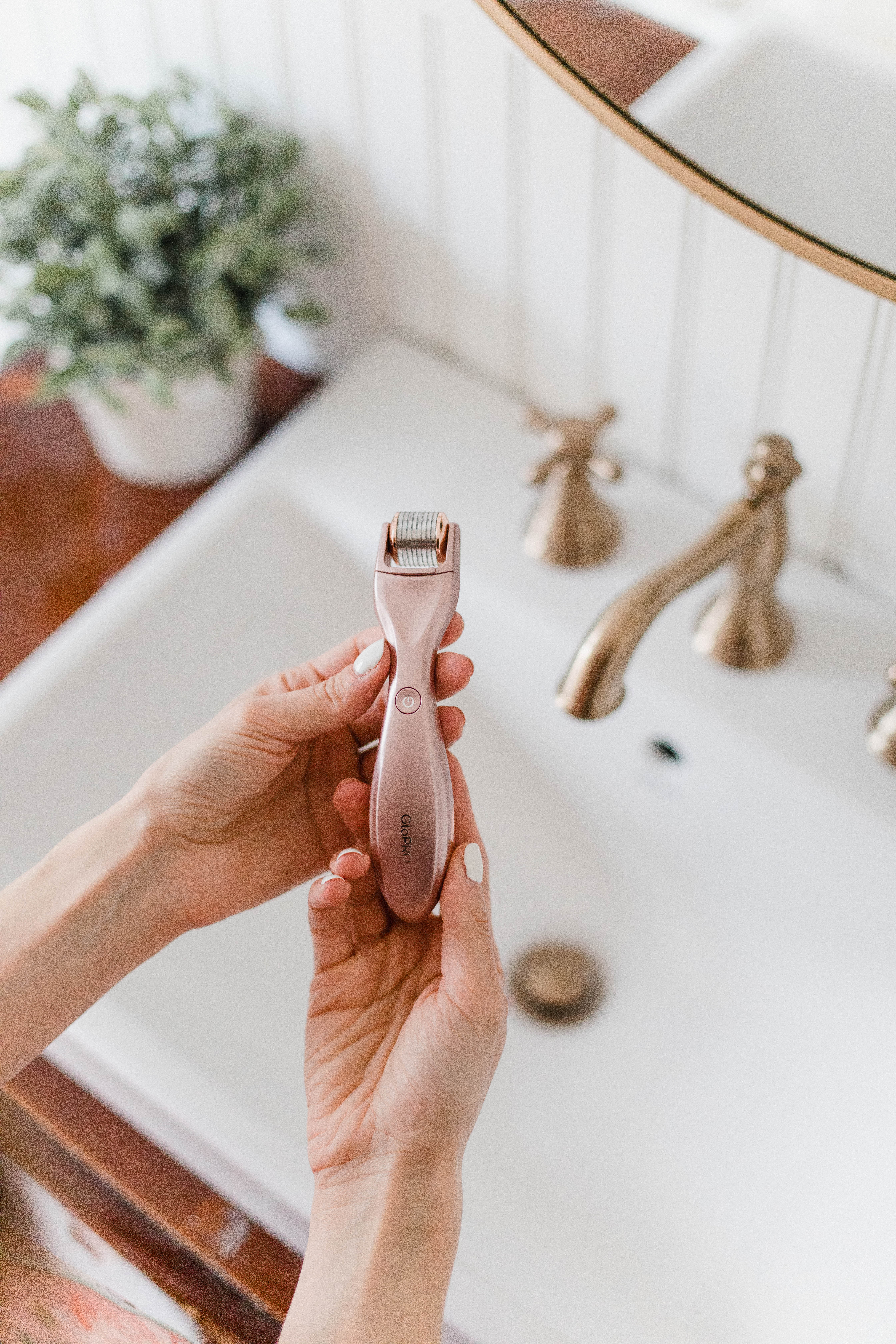 Connecticut life and style blogger Lauren McBride shares why she loves her GloPRO including results and how to use this at-home microneedling tool. 