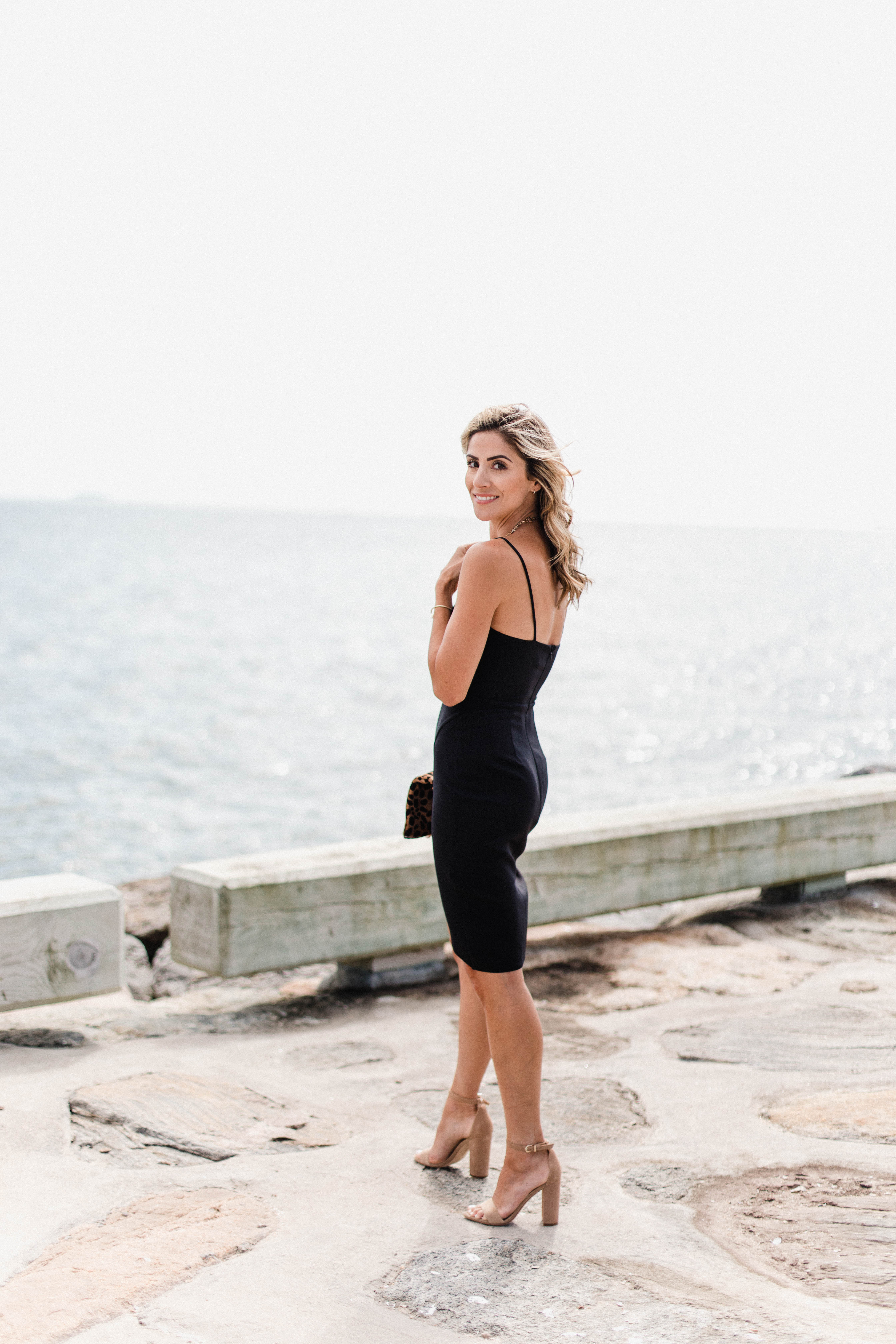 Connecticut life and style blogger Lauren McBride shares Summer Wedding Guest Dress options, as well as how to transition them to the fall season.