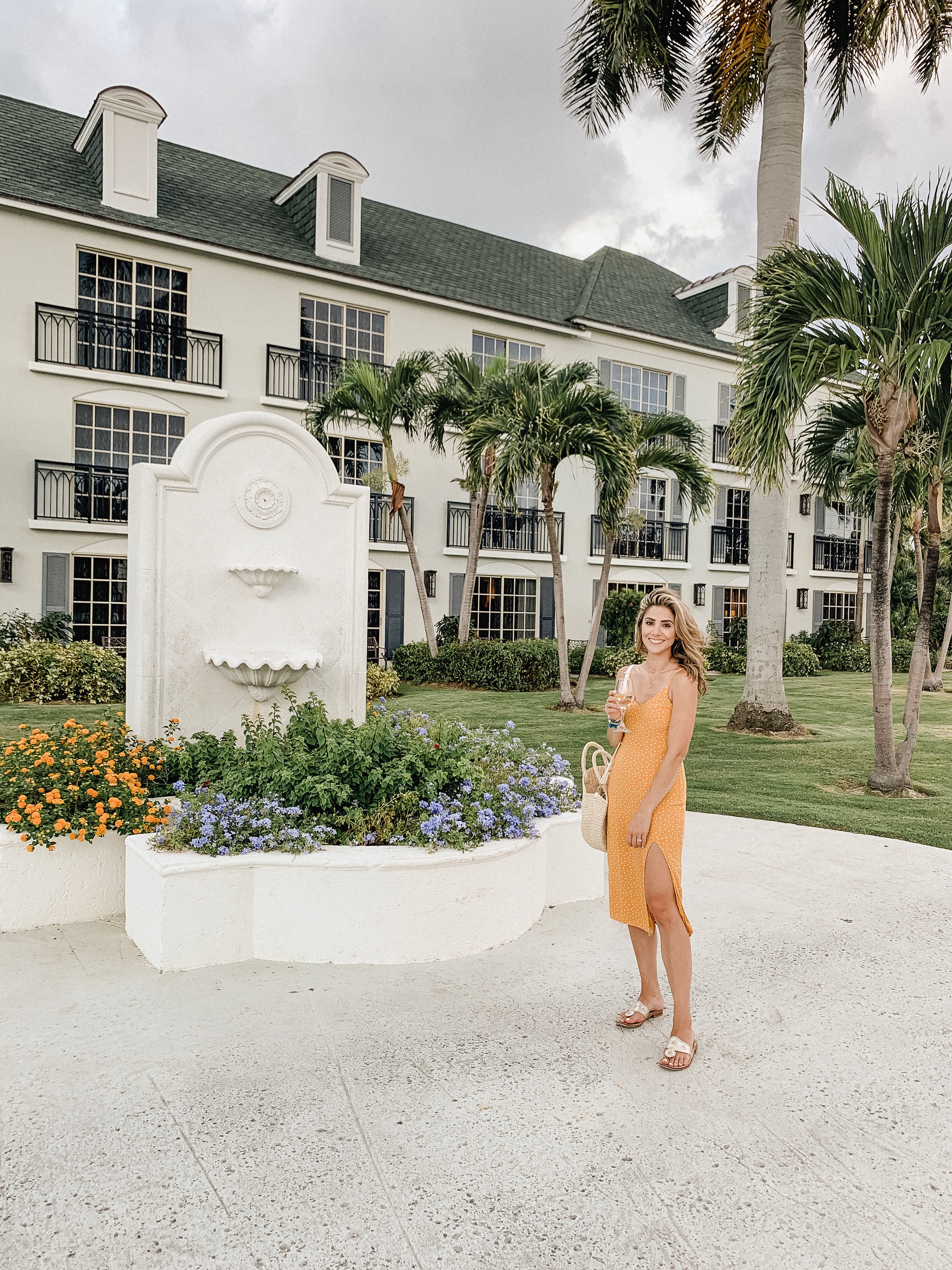 Connecticut life and style blogger Lauren McBride shares a Turks & Caicos outfit roundup, including dresses, coverups, and bathing suits.