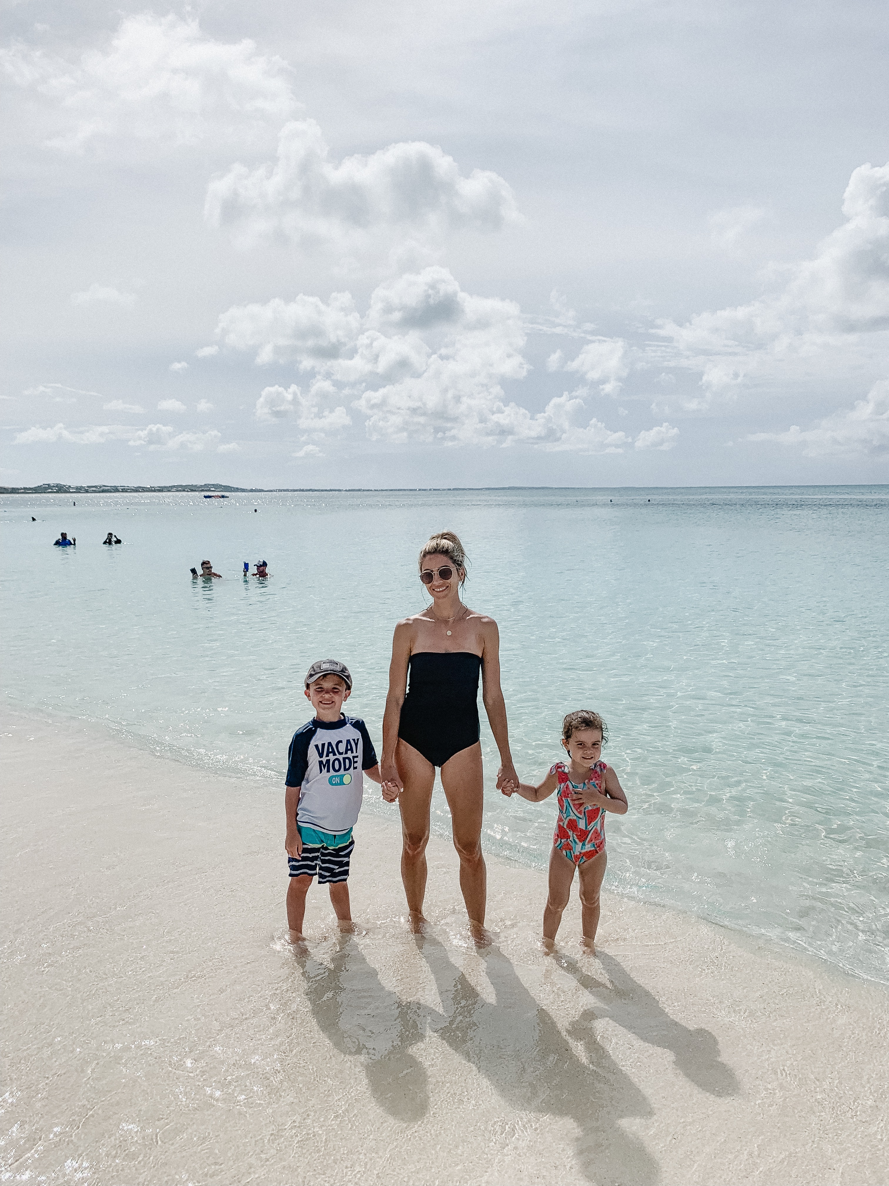 Connecticut life and style blogger Lauren McBride shares a Turks & Caicos outfit roundup, including dresses, coverups, and bathing suits.