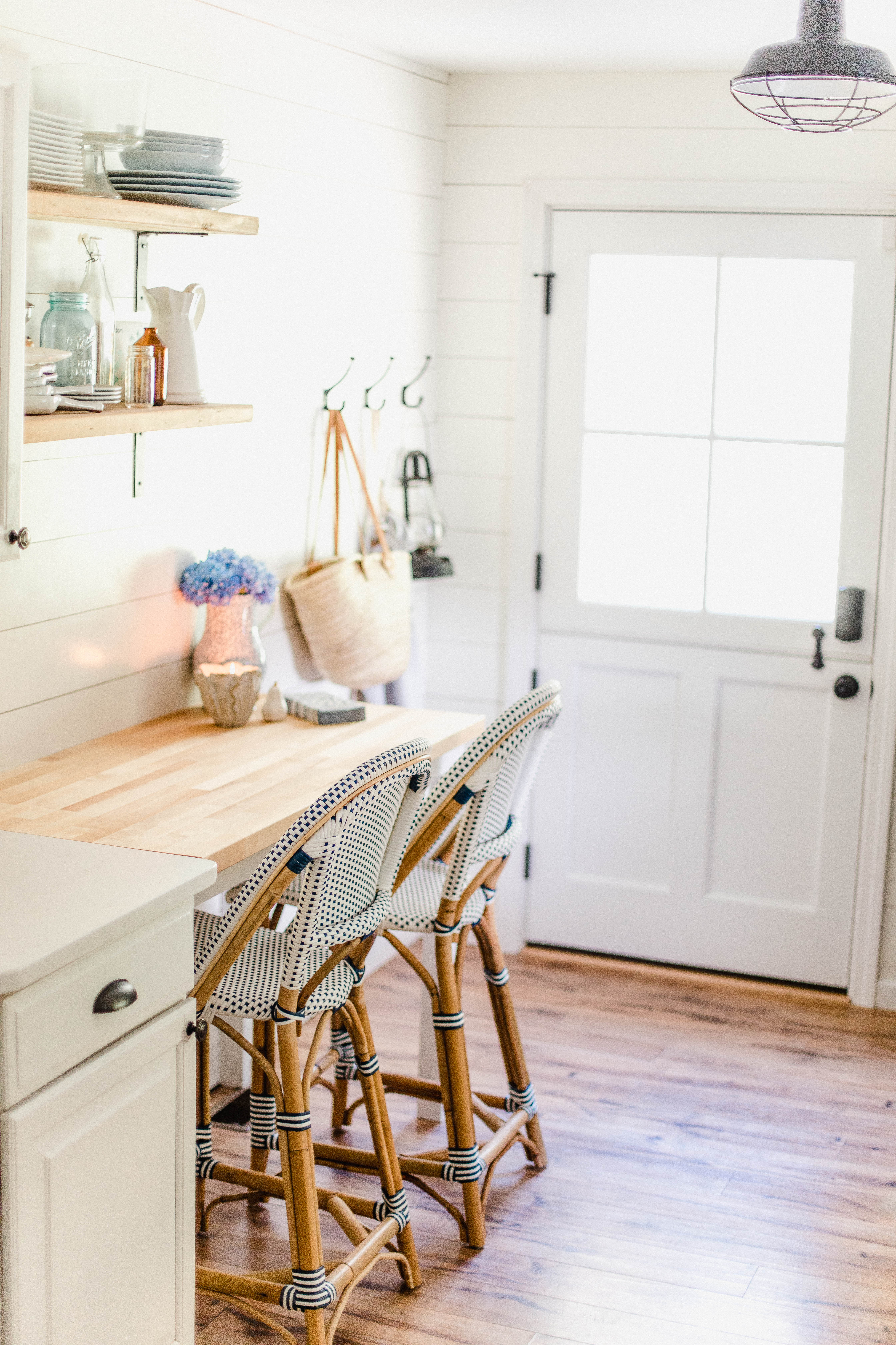 Connecticut life and style blogger Lauren McBride shares her Custom Breakfast Nook and other kitchen updates to maximize space in a small kitchen.