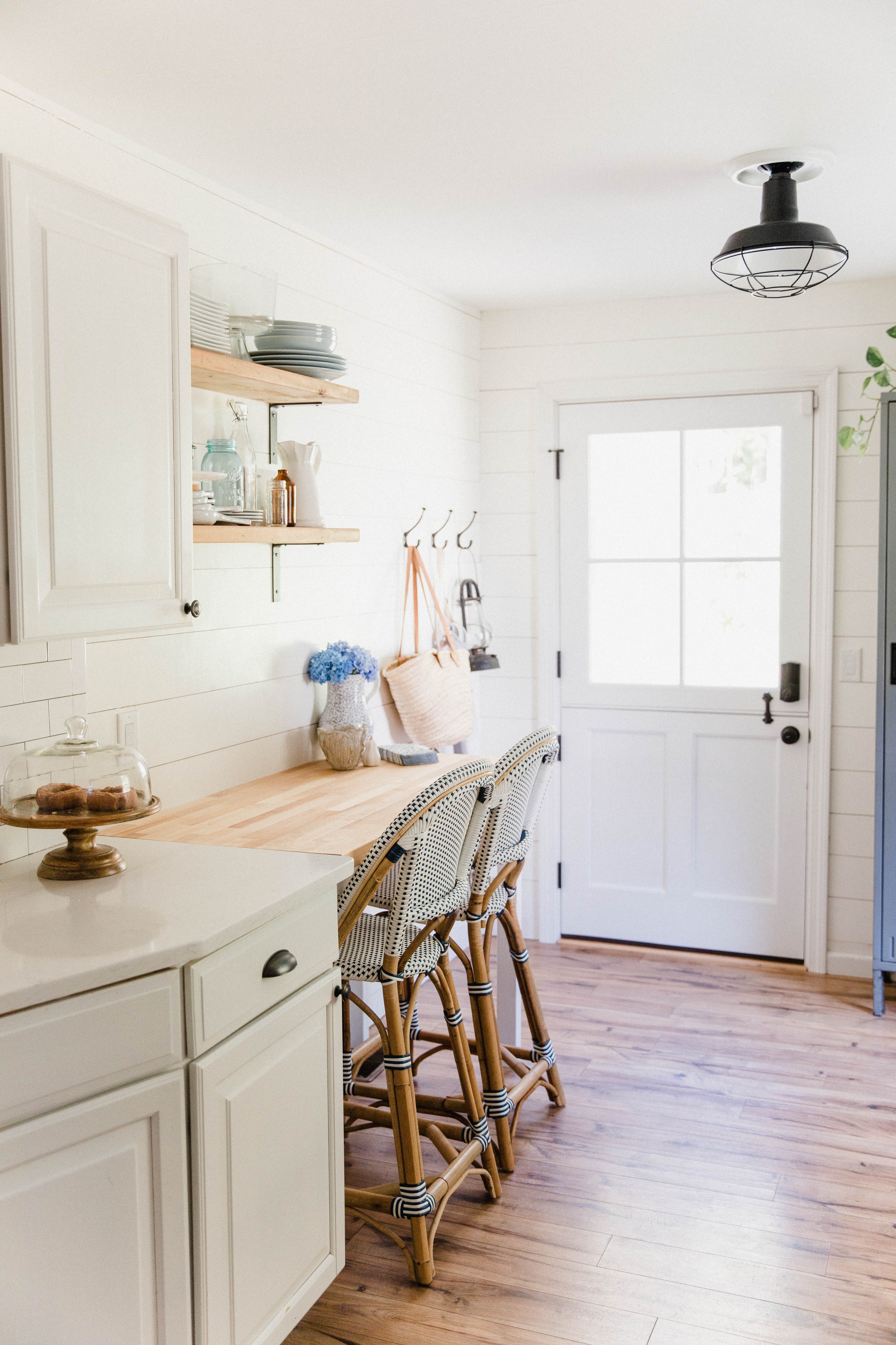 Connecticut life and style blogger Lauren McBride shares her Custom Breakfast Nook and other kitchen updates to maximize space in a small kitchen.