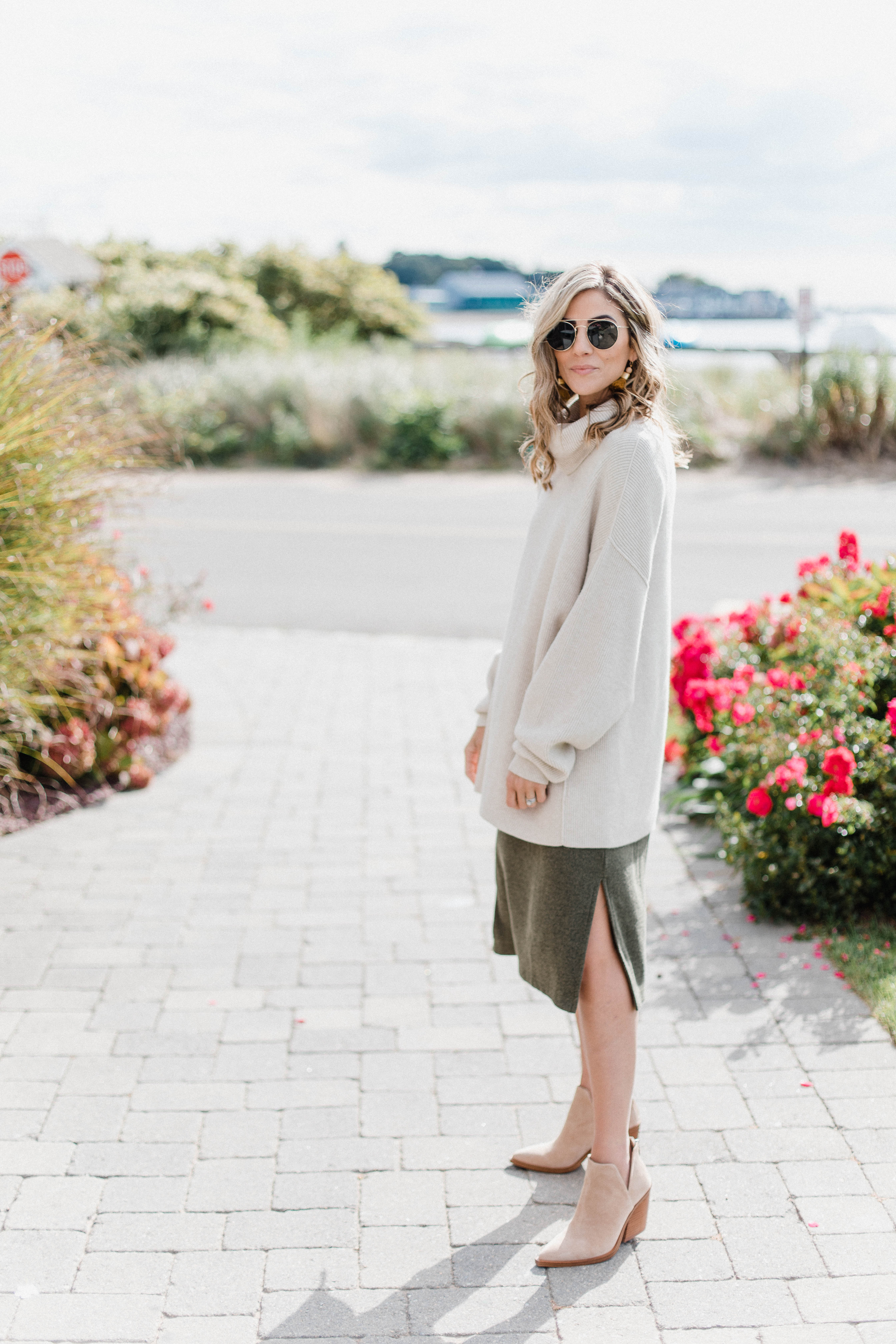 Connecticut life and style blogger Lauren McBride shares How to Style a Sweater Dress for Fall multiple ways to show the versatility of this one wardrobe addition. 