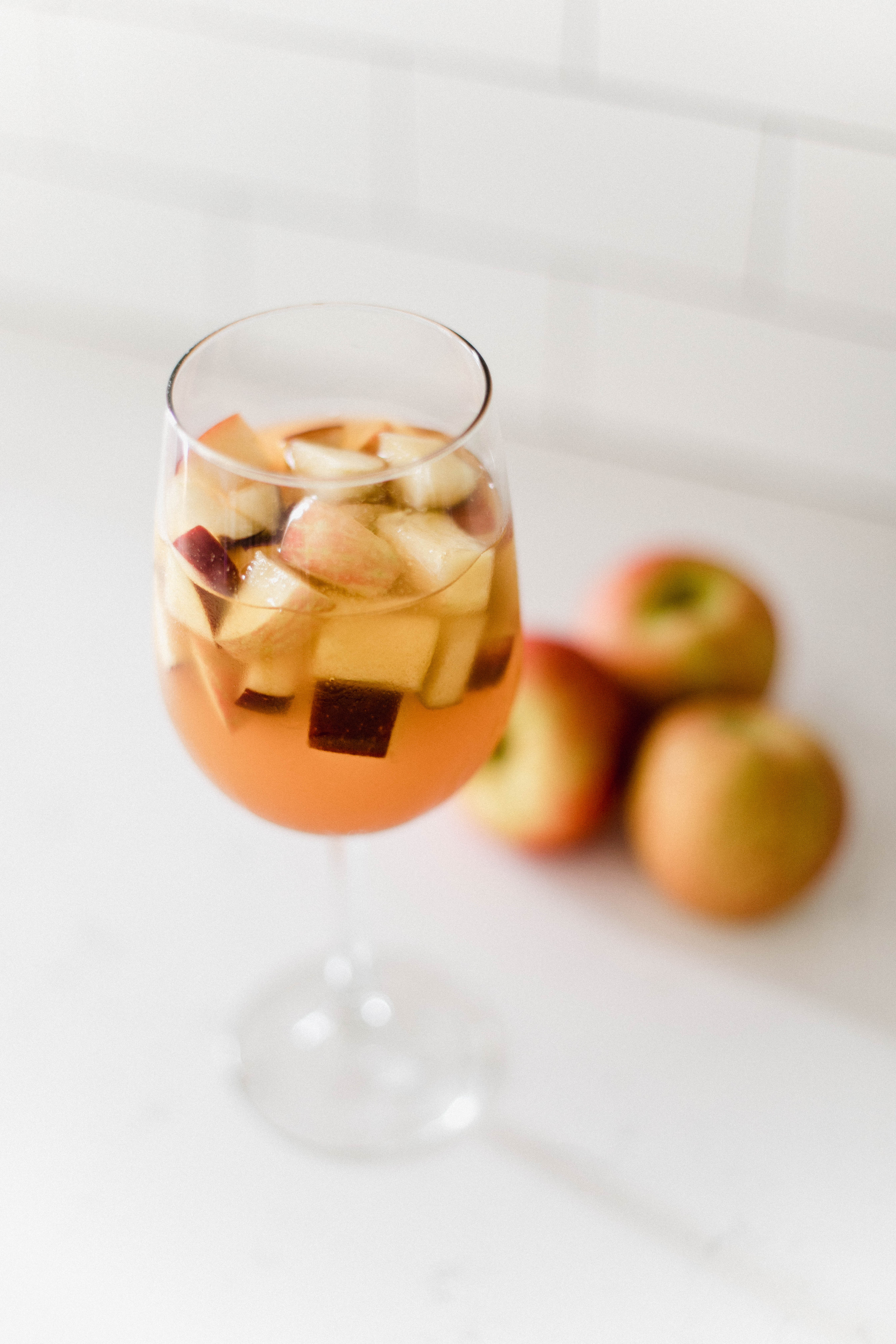Connecticut life and style blogger Lauren McBride shares a Caramel Apple Cider Sangria recipe that's a fun, adult twist on a favorite fall beverage.