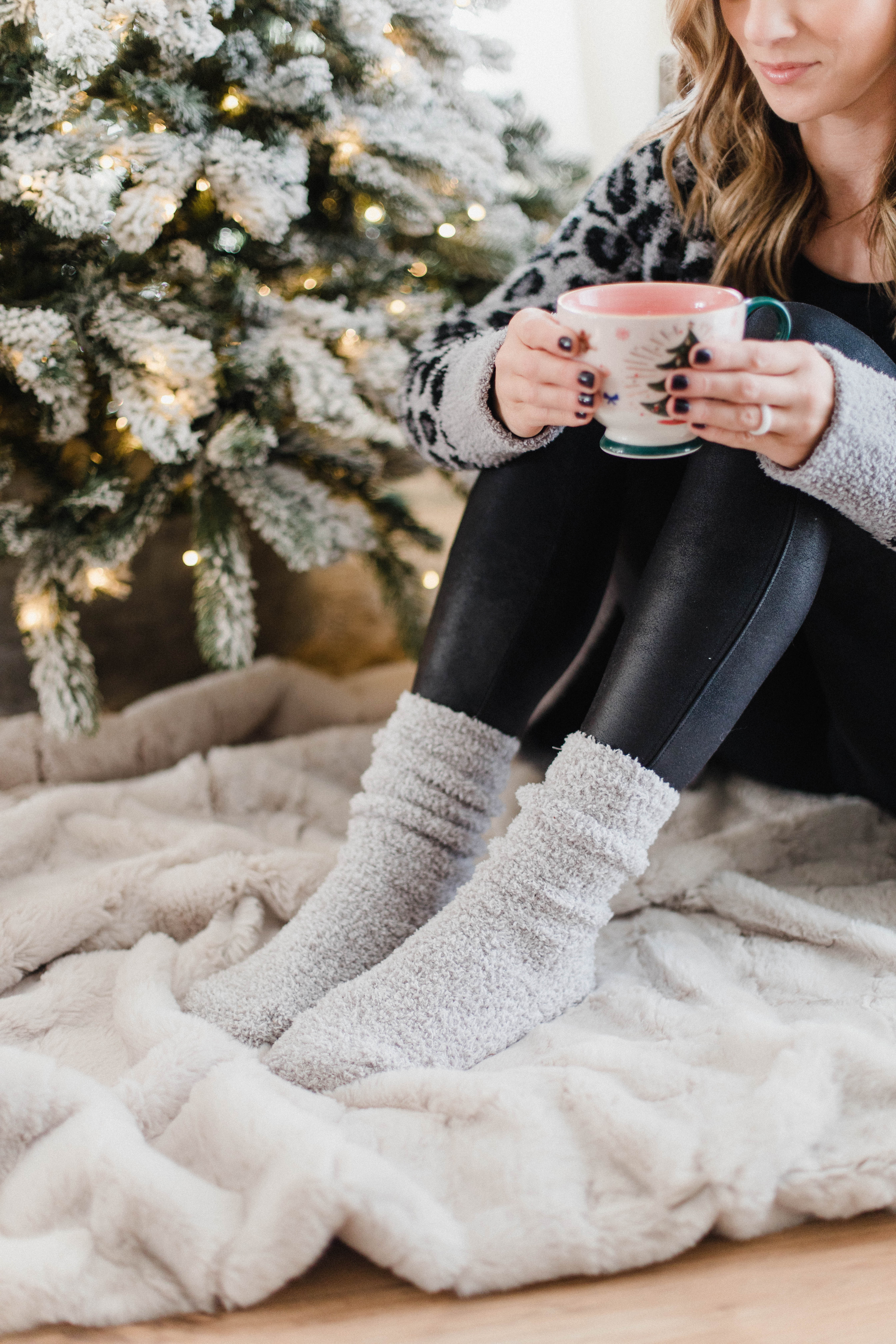 Connecticut life and style blogger Lauren McBride shares her Holiday Gift Guide for Cozy gifts, featuring Barefoot Dreams, Muk Luks, and more.