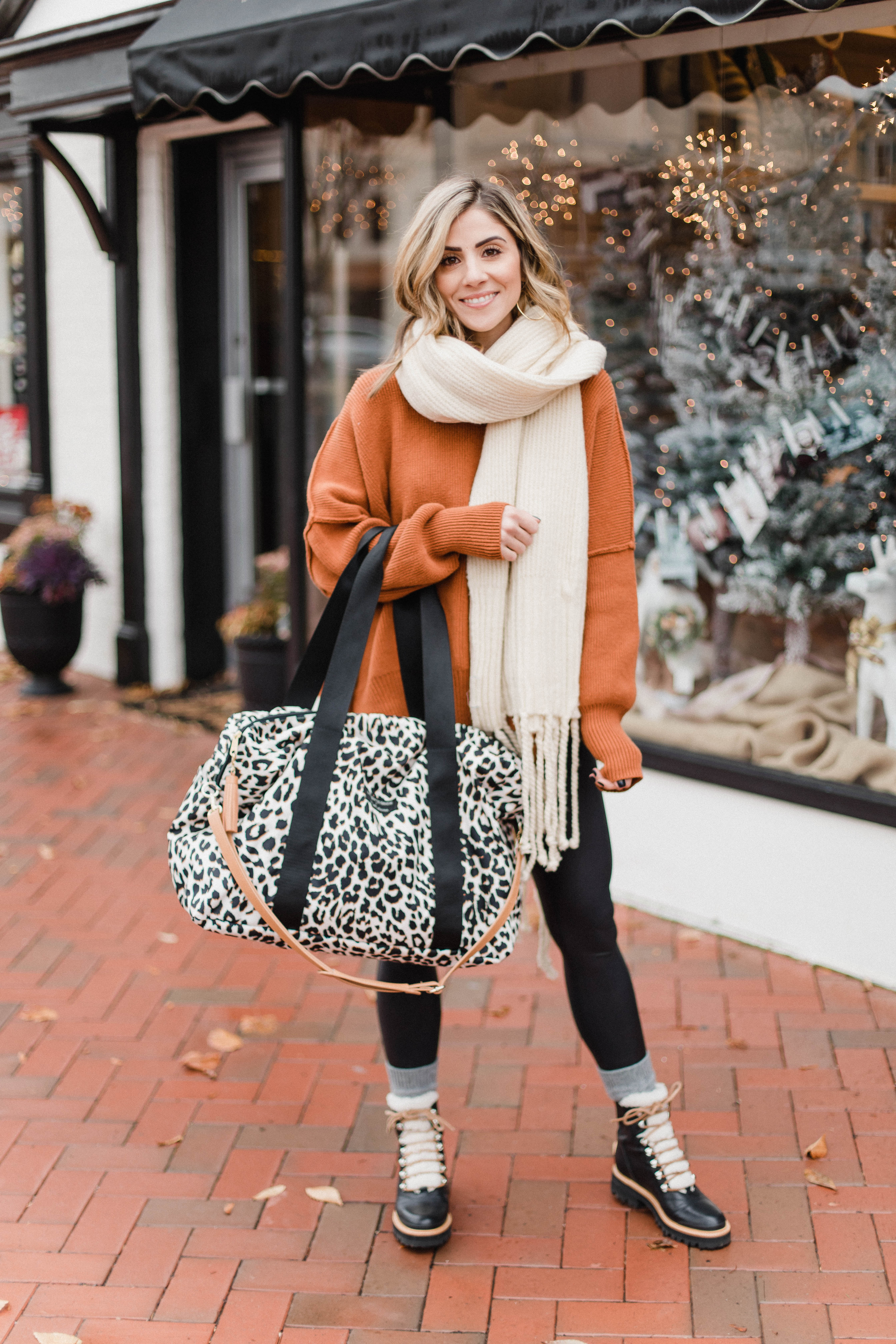 Connecticut life and style blogger Lauren McBride shares her Lauren McBride x Logan and Lenora collection launch, featuring a leopard print waterproof and stain resistant travel bag.