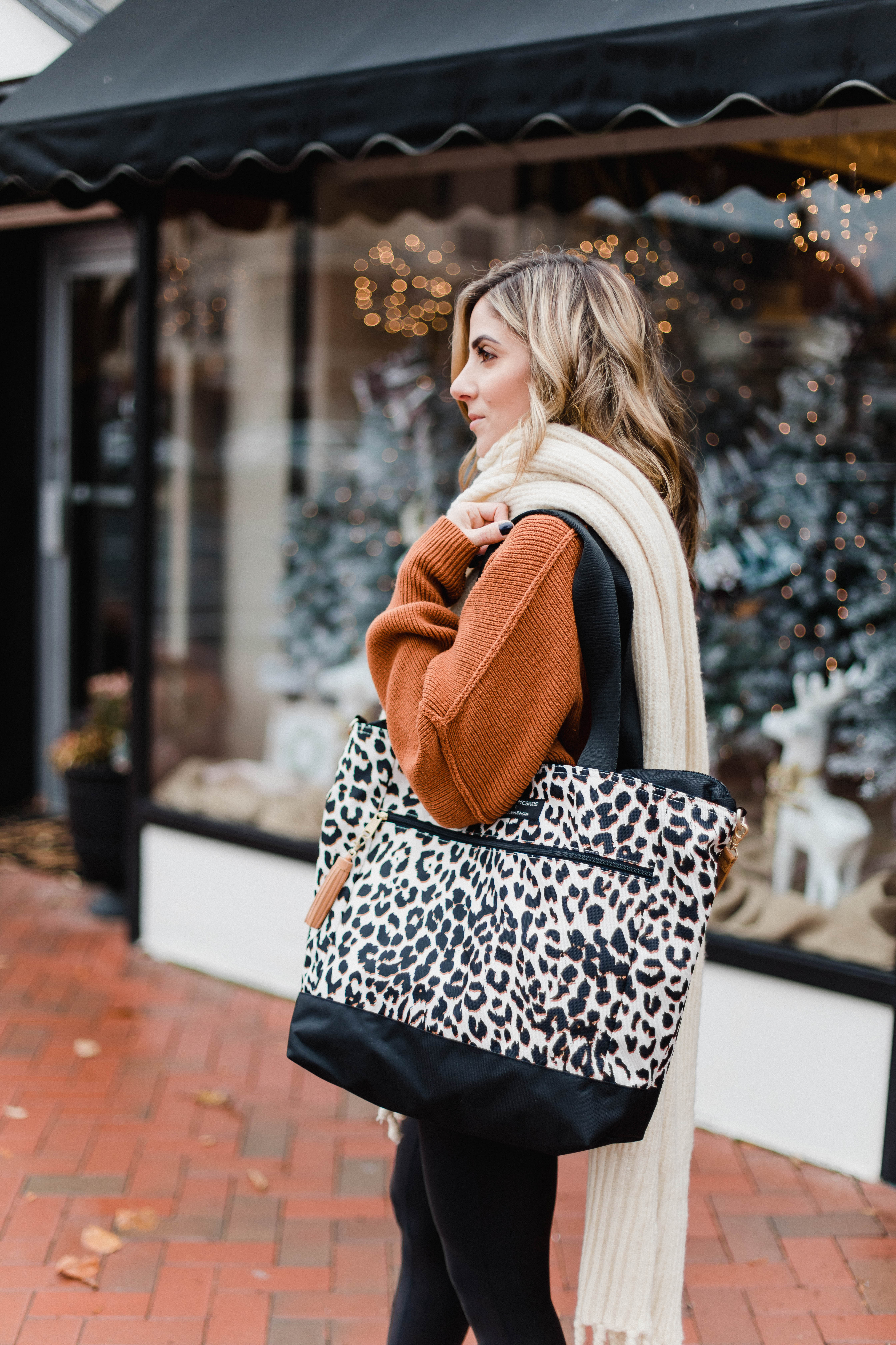 Connecticut life and style blogger Lauren McBride shares her Lauren McBride x Logan and Lenora collection launch, featuring a leopard print waterproof and stain resistant travel bag.
