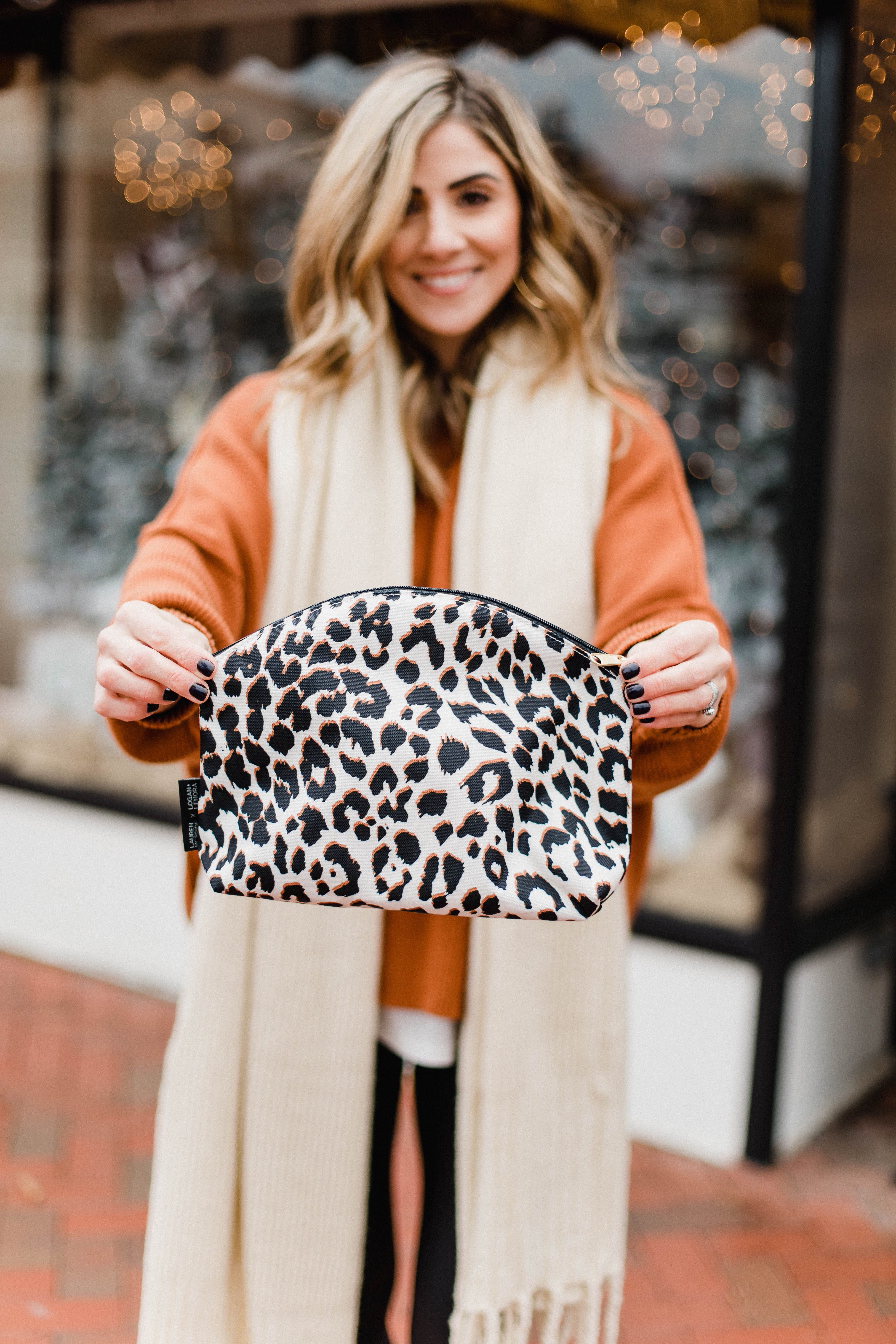 Connecticut life and style blogger Lauren McBride shares her Lauren McBride x Logan and Lenora collection launch, featuring a leopard print waterproof and stain resistant travel bag.