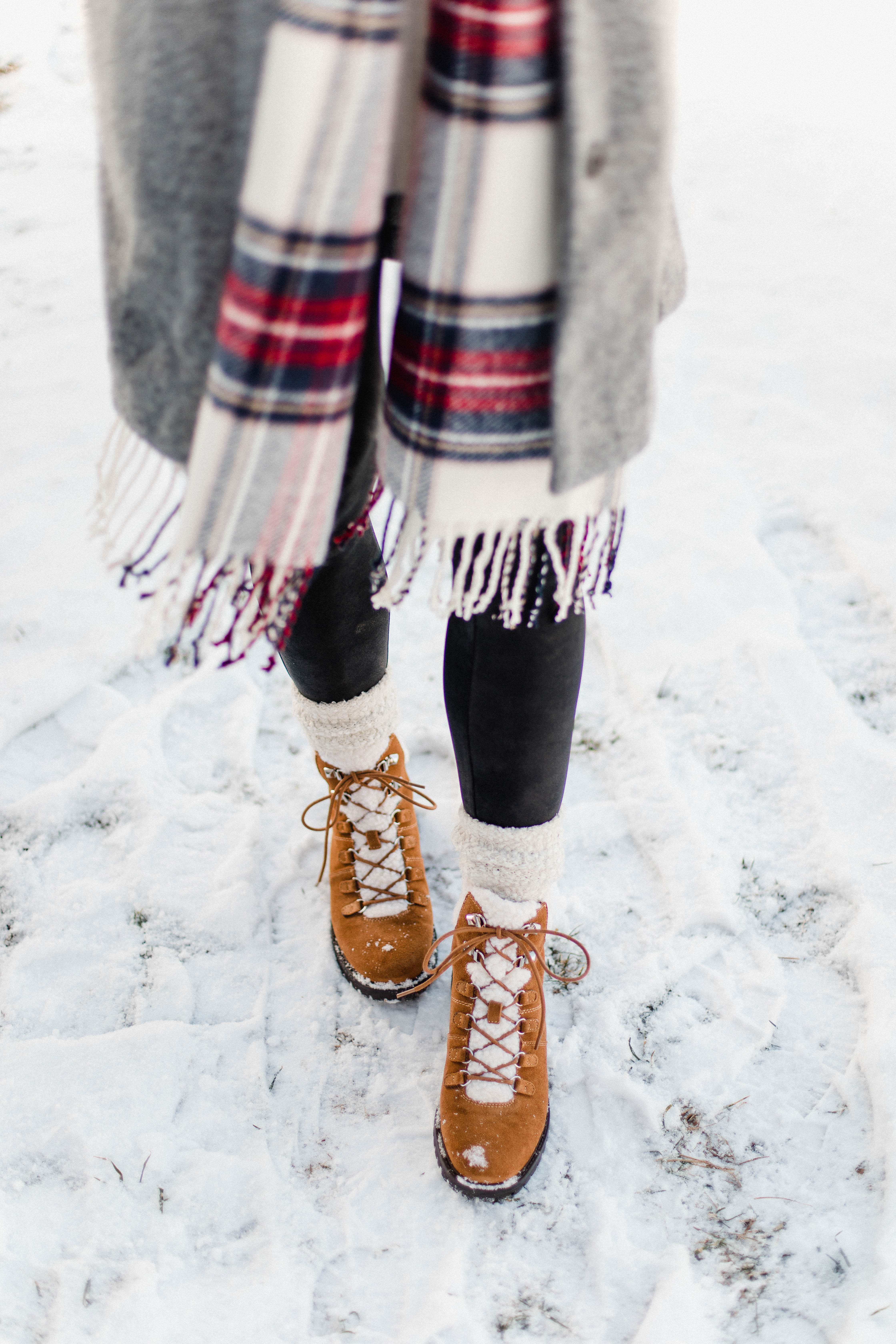 Connecticut life and style blogger Lauren McBride shares a pair of faux-fur shearling boots that are under $100 and perfect for the winter season.