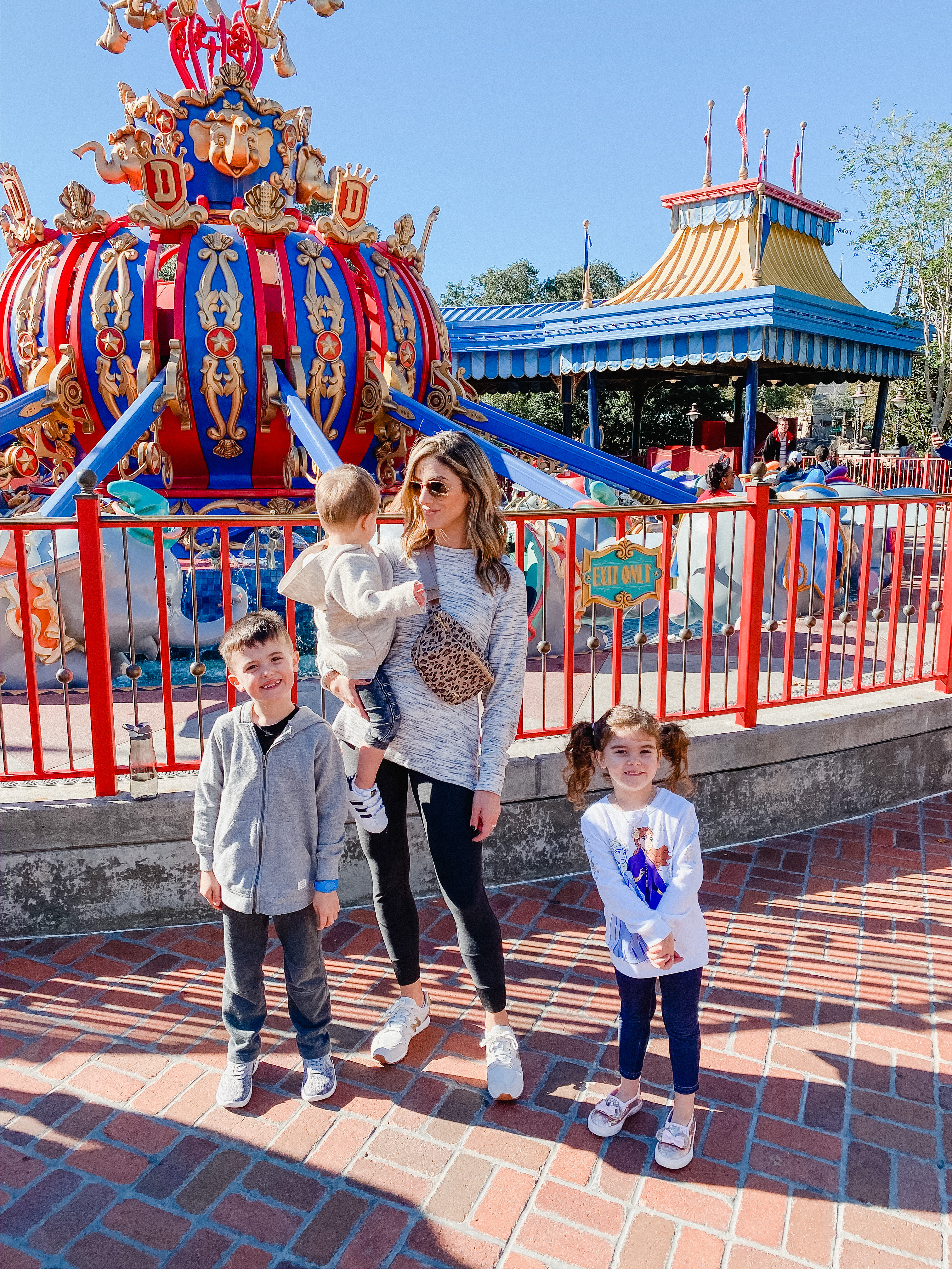 Connecticut life and style blogger Lauren McBride shares what to pack for Disney World in December, including a variety of simple and comfortable outfit ideas.