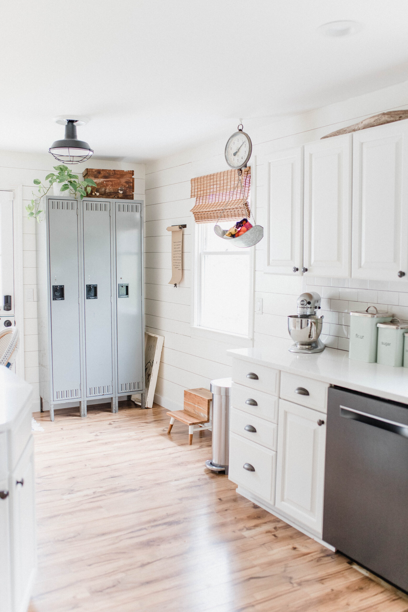 Connecticut life and style blogger Lauren McBride shares her farmhouse inspired kitchen in her coastal farmhouse home, including source list.