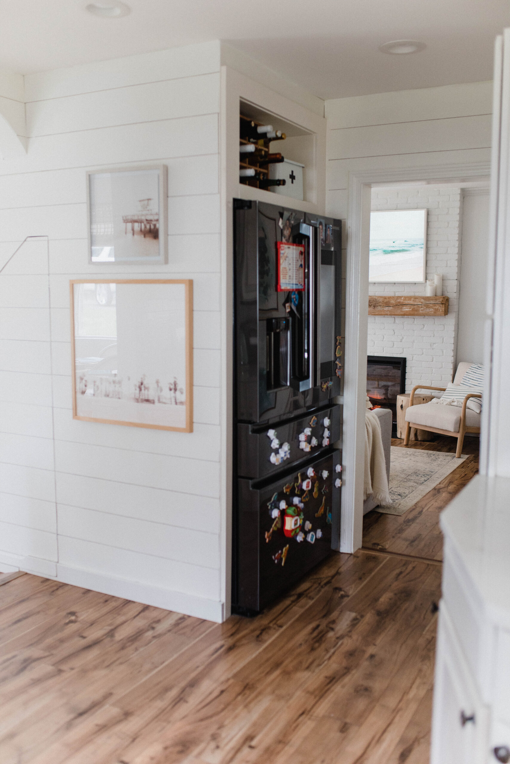 Connecticut life and style blogger Lauren McBride shares her farmhouse inspired kitchen in her coastal farmhouse home, including source list.