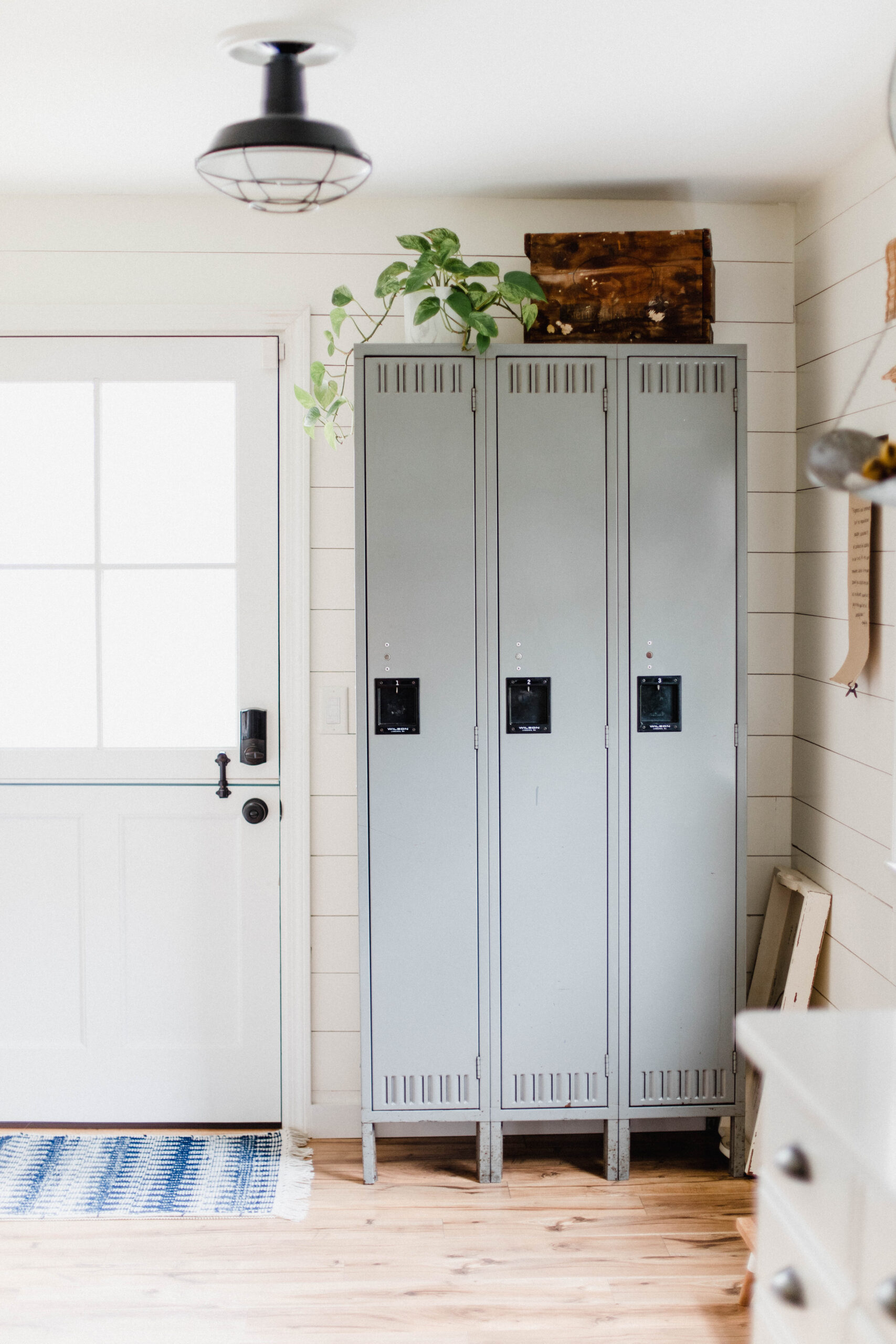 Connecticut life and style blogger Lauren McBride shares her farmhouse inspired kitchen in her coastal farmhouse home, including source list.