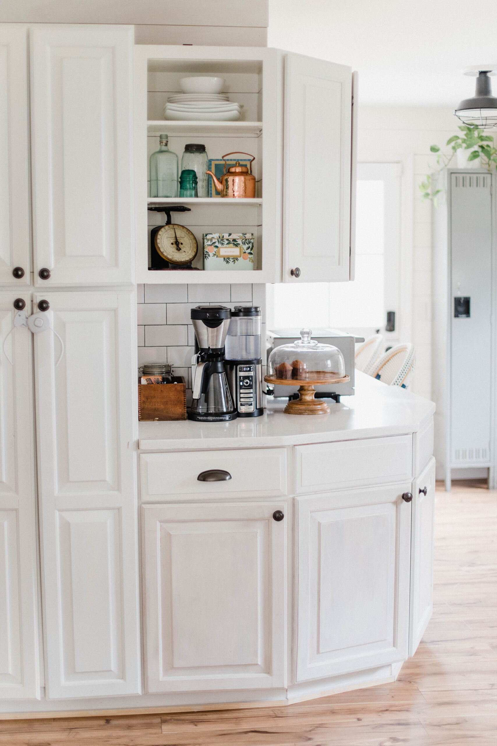 Connecticut life and style blogger Lauren McBride shares her farmhouse inspired kitchen in her coastal farmhouse home, including source list.