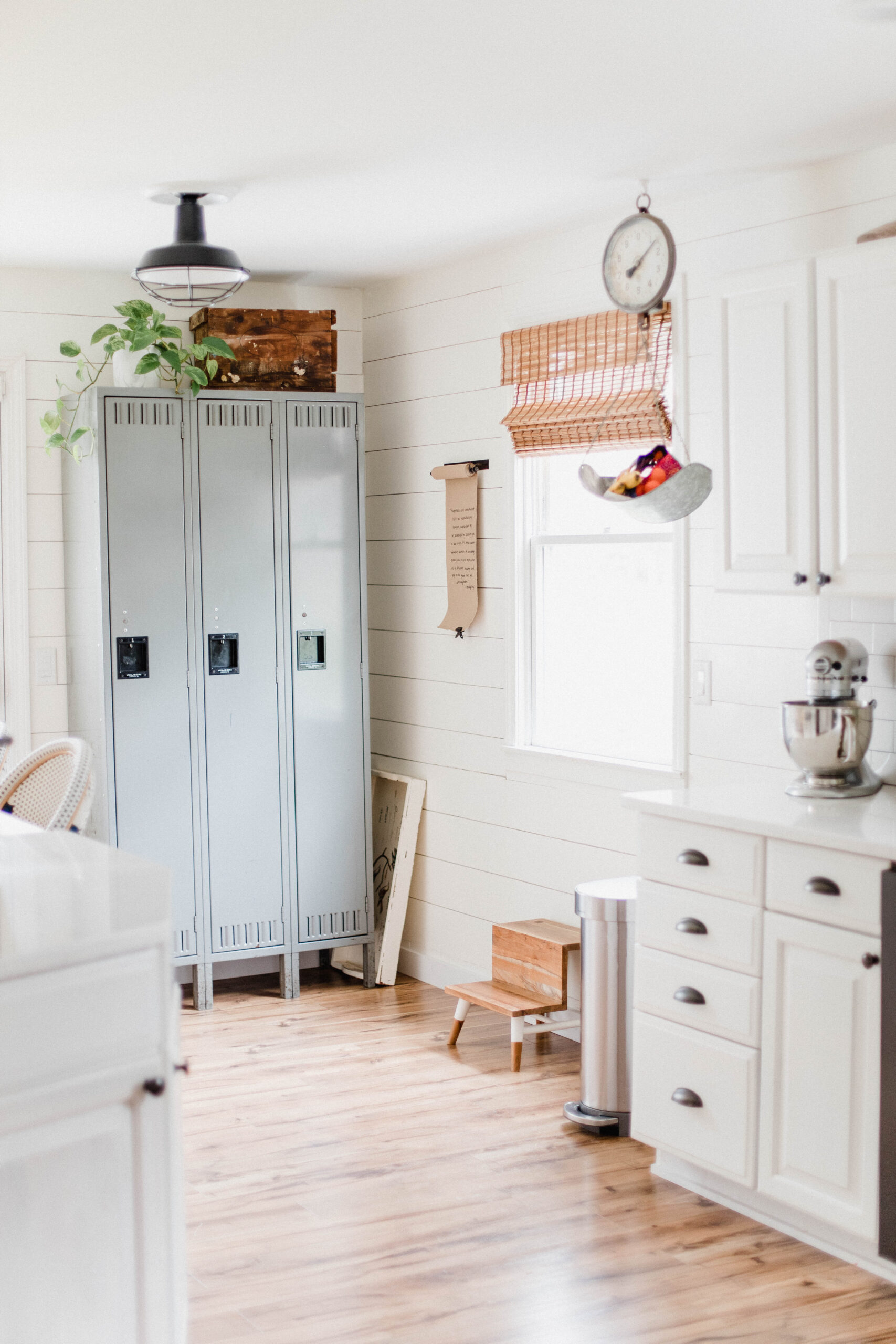 Connecticut life and style blogger Lauren McBride shares her farmhouse inspired kitchen in her coastal farmhouse home, including source list.