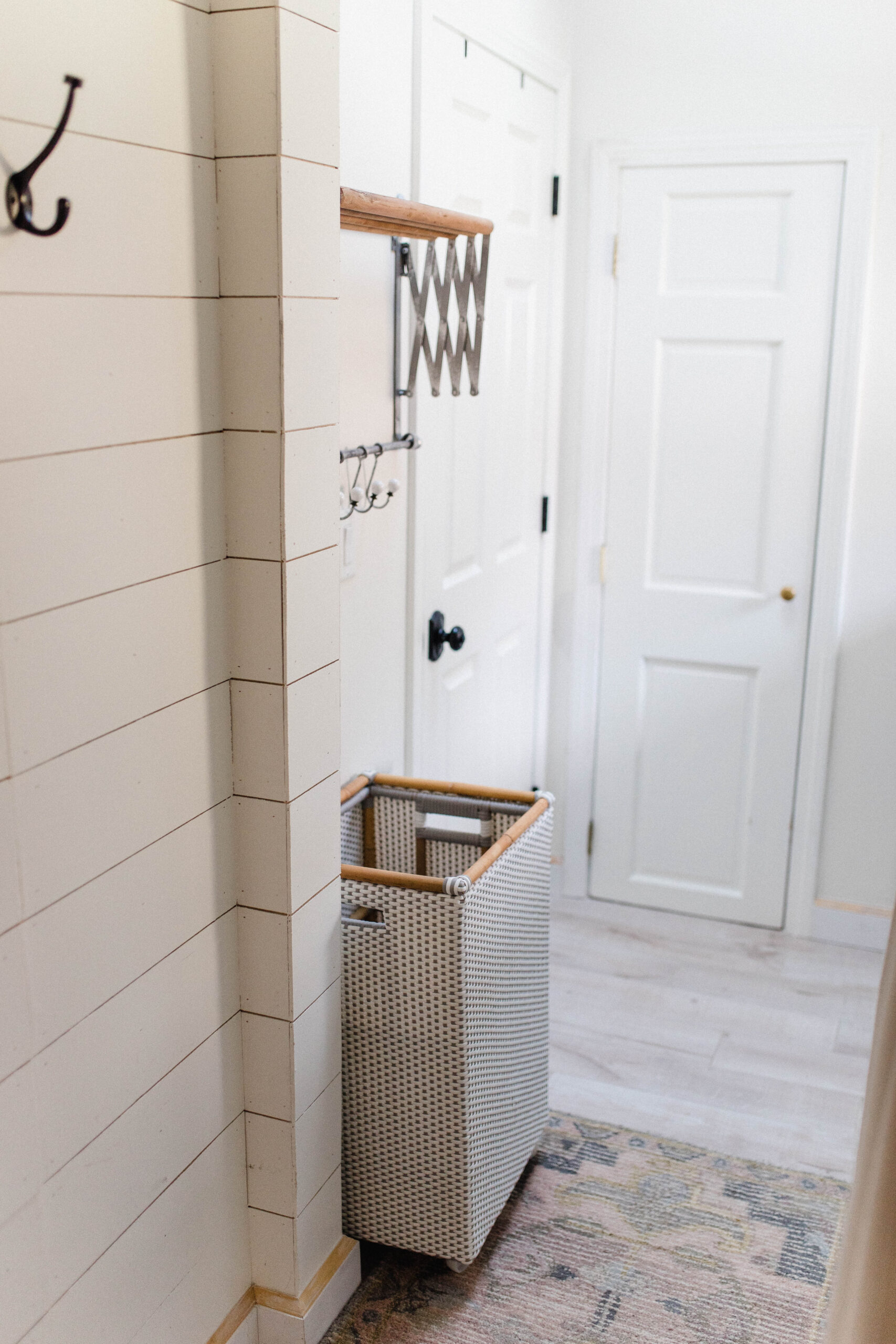 Connecticut life and style blogger Lauren McBride shares her laundry room, the small DIY projects that made a big impact, and sources.