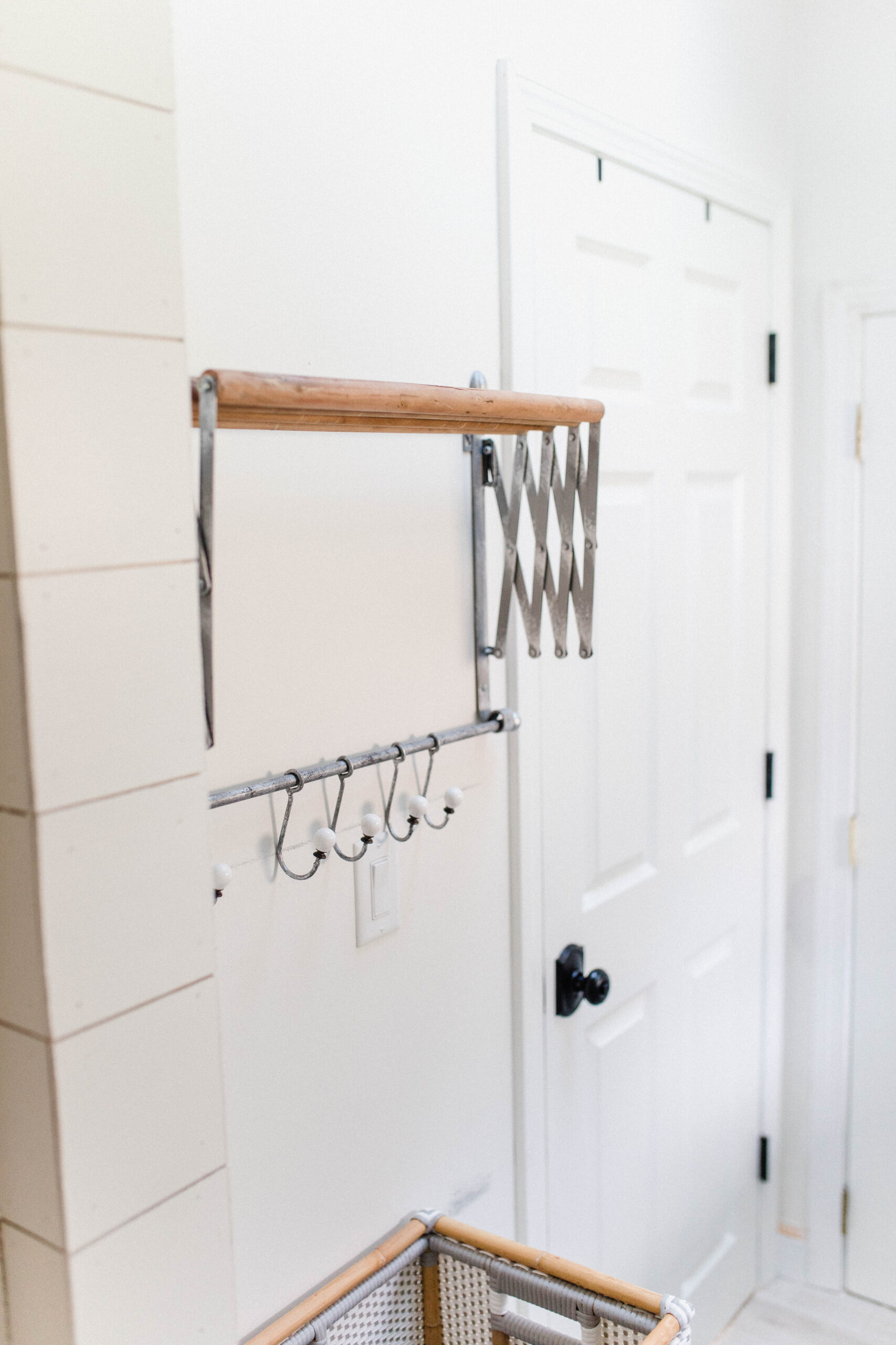 Connecticut life and style blogger Lauren McBride shares her laundry room, the small DIY projects that made a big impact, and sources.