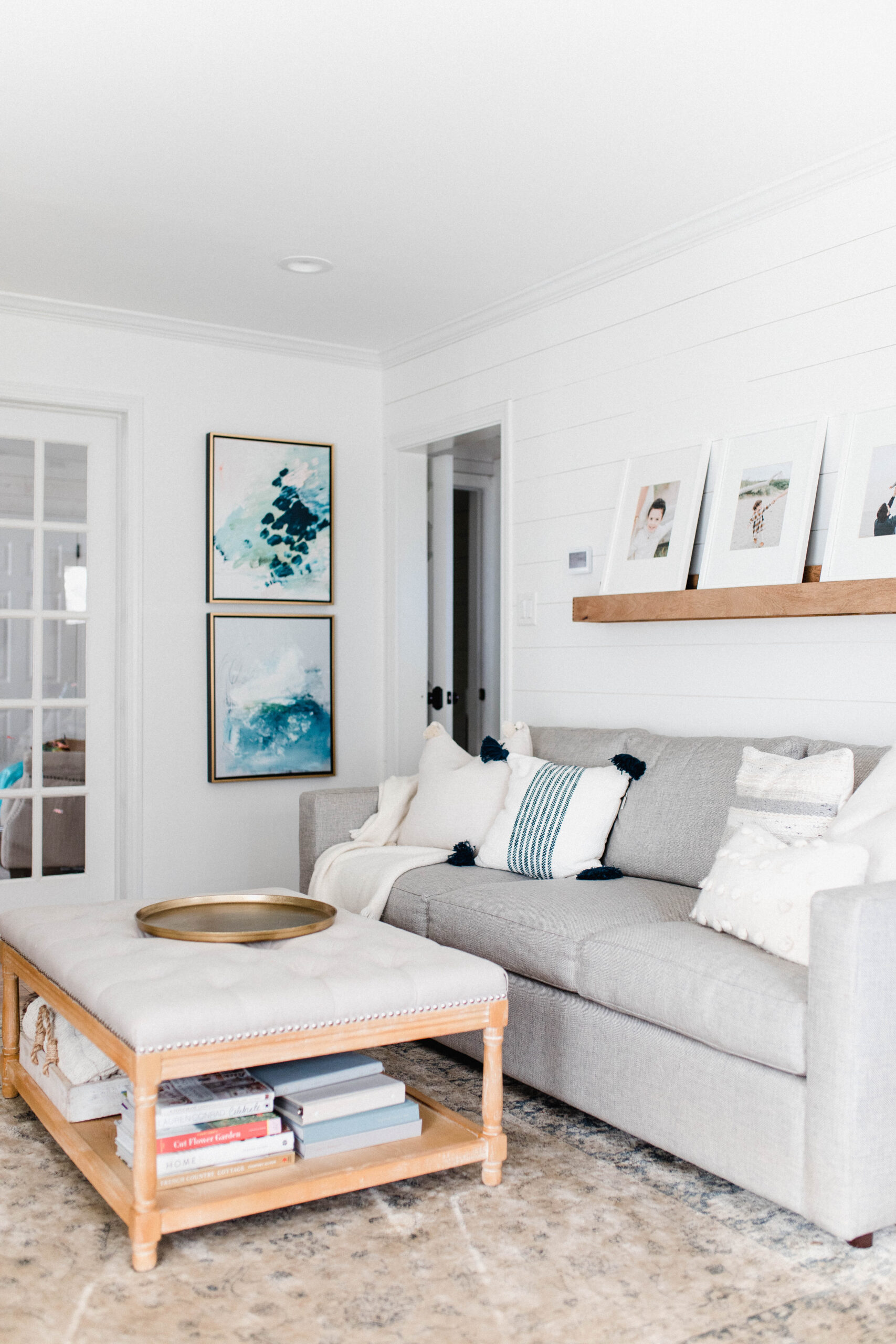 Connecticut life and style blogger Lauren McBride shares a home tour of her East Coast casual living room space, complete with source list.