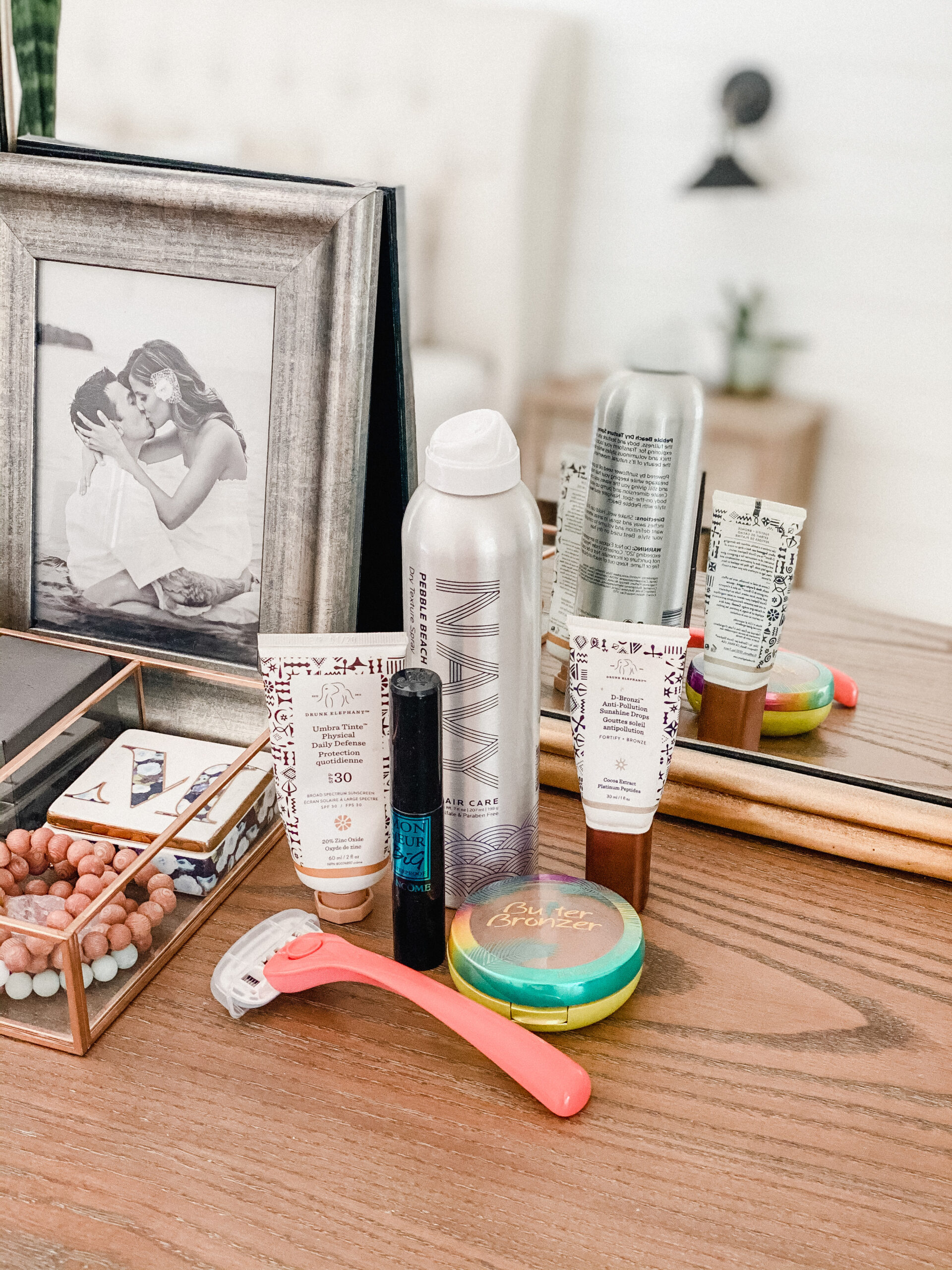 Connecticut life and style blogger Lauren McBride shares her summer beauty favorites, including makeup, skincare, hair care, and body products.