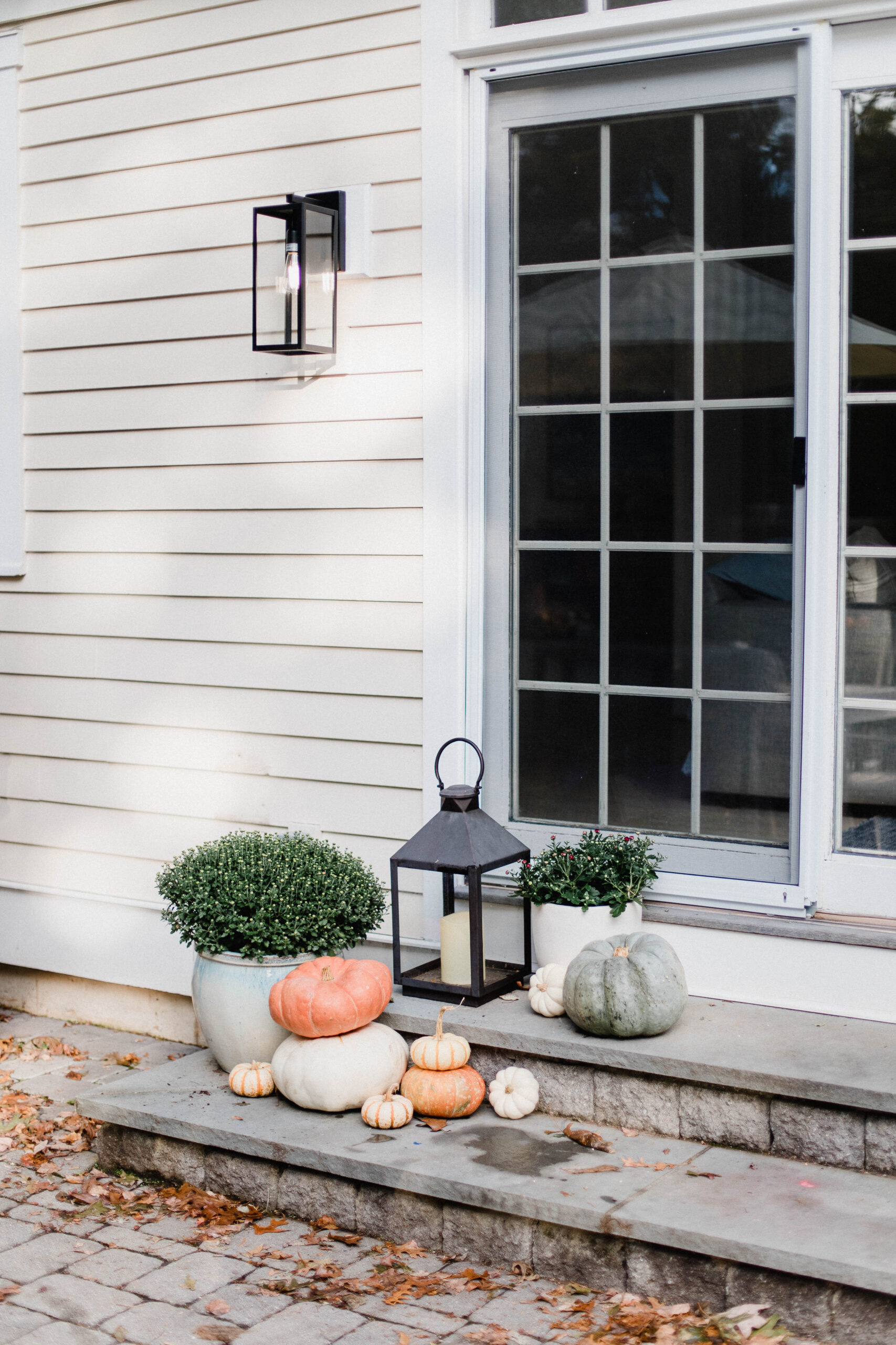 Looking for fall front porch ideas? Connecticut life and style blogger Lauren McBride shares her fall-inspired porch with sources.