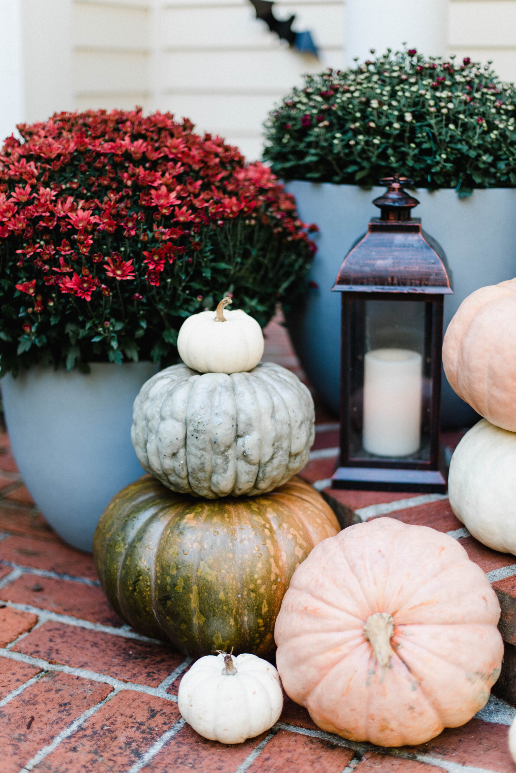 Looking for fall front porch ideas? Connecticut life and style blogger Lauren McBride shares her fall-inspired porch with sources.