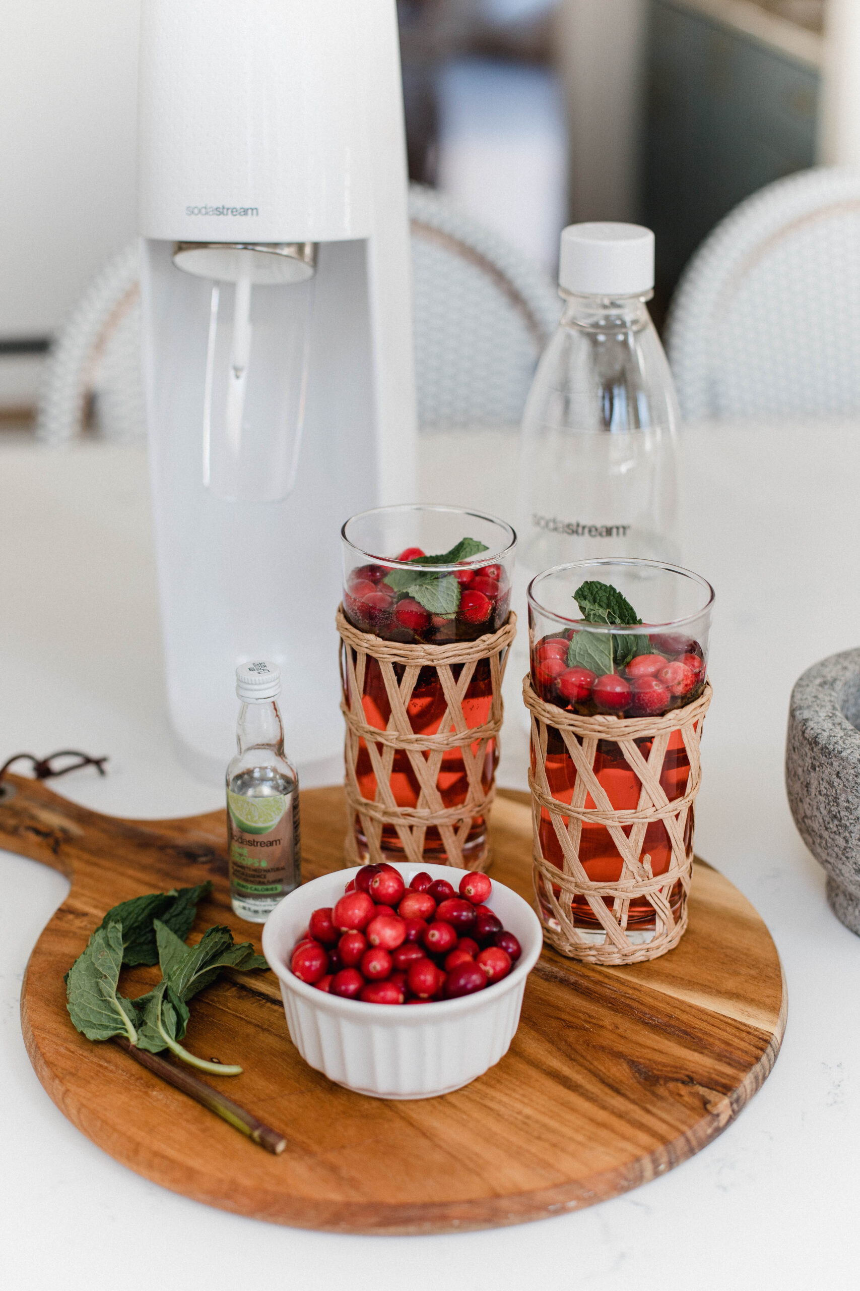 Looking for a festive holiday drink? This Cranberry Mint Lime Spritzer by Connecticut life and style blogger Lauren McBride is easy and delicious.