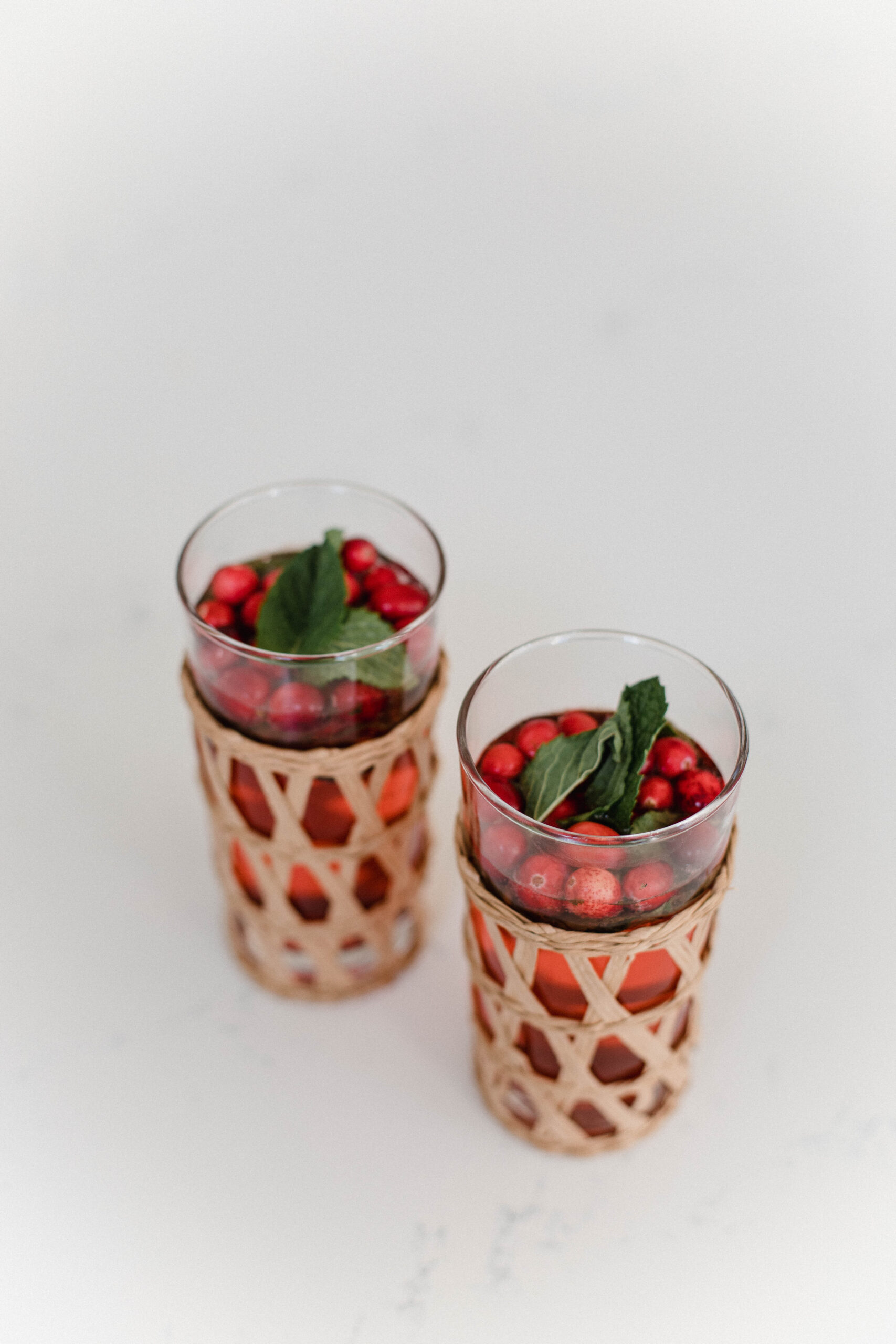 Looking for a festive holiday drink? This Cranberry Mint Lime Spritzer by Connecticut life and style blogger Lauren McBride is easy and delicious.