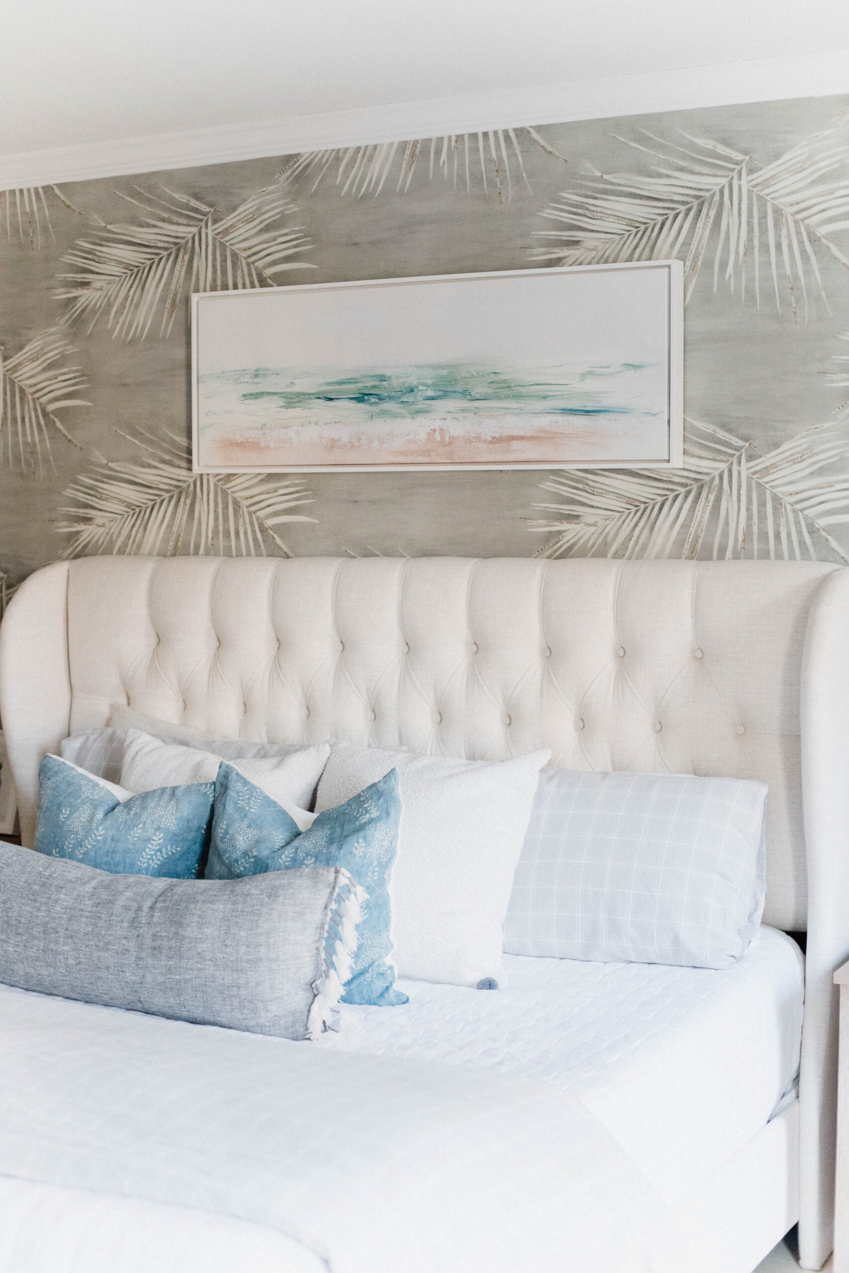 Connecticut life and style blogger Lauren McBride shares the coastal artwork in her modern coastal inspired home.