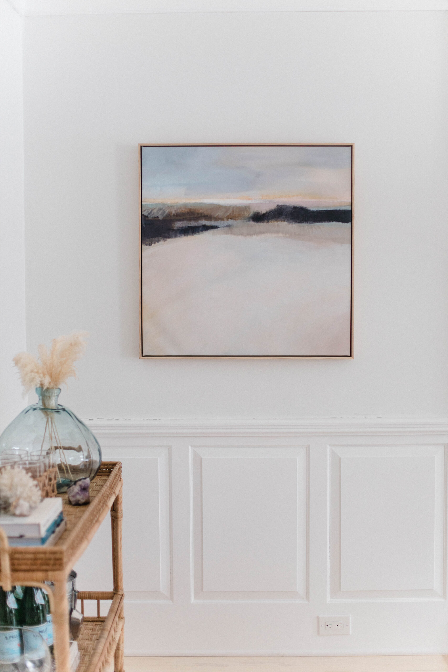 Connecticut life and style blogger Lauren McBride shares the coastal artwork in her modern coastal inspired home.