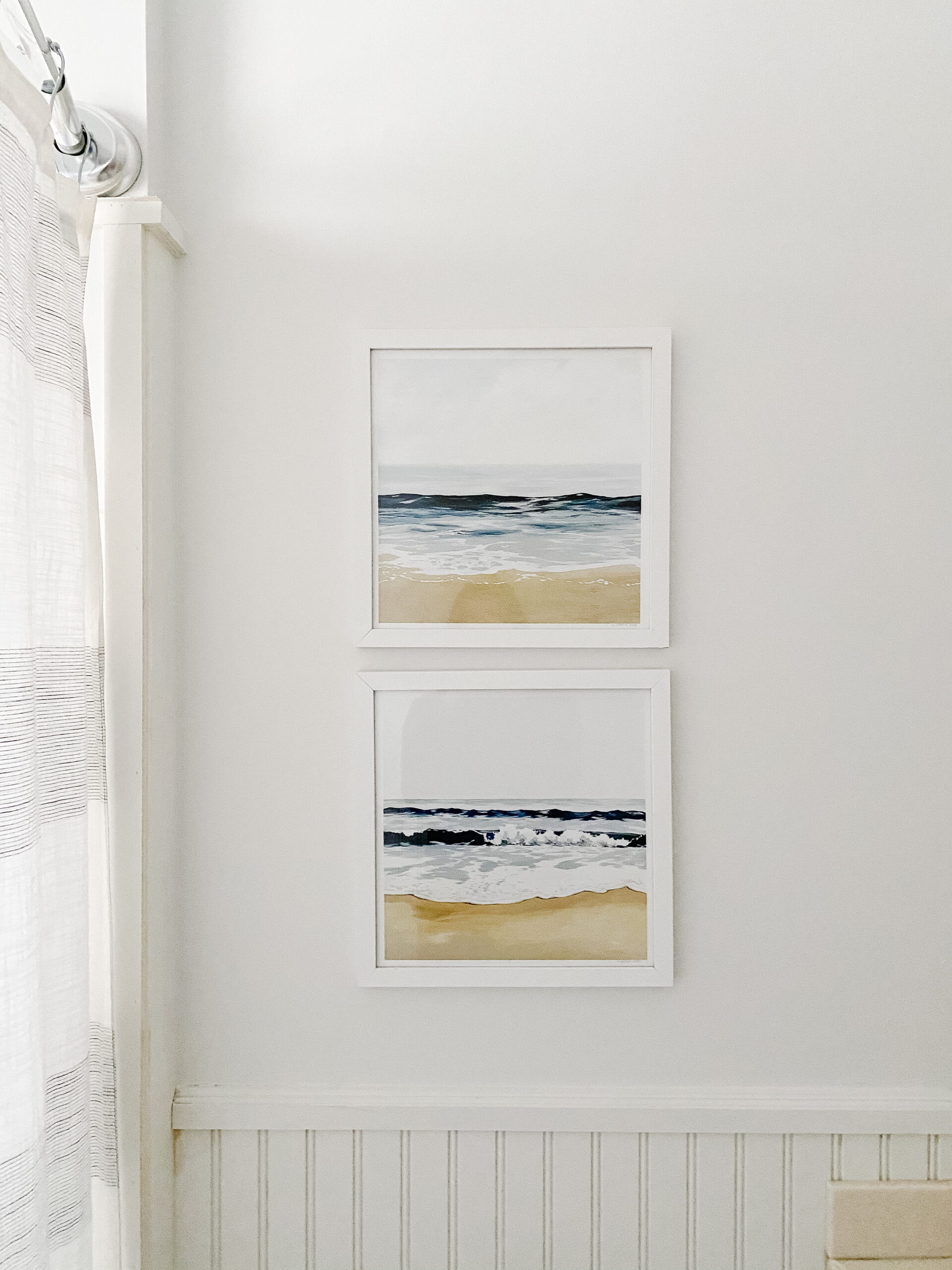 Connecticut life and style blogger Lauren McBride shares the coastal artwork in her modern coastal inspired home.