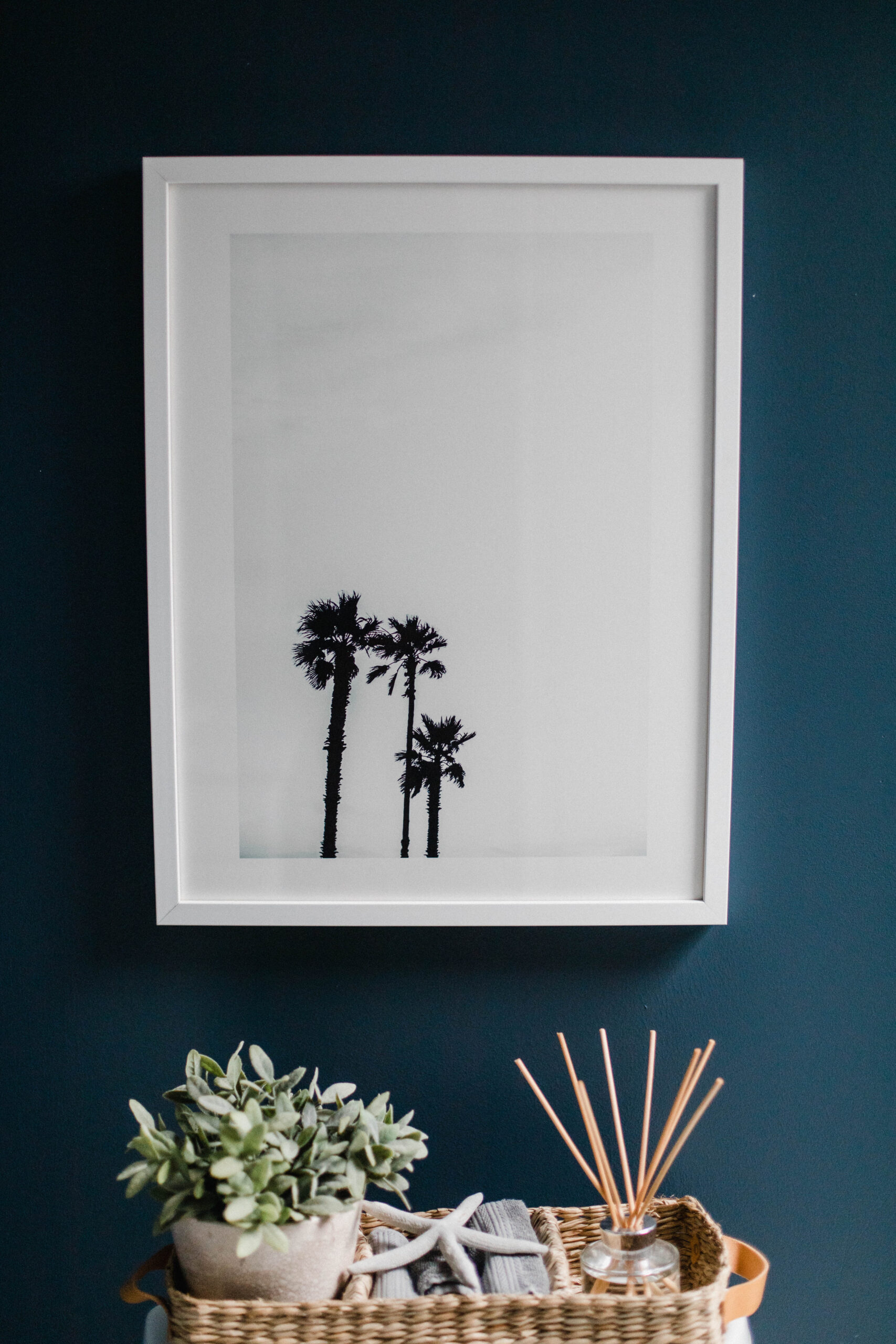 Connecticut life and style blogger Lauren McBride shares the coastal artwork in her modern coastal inspired home.