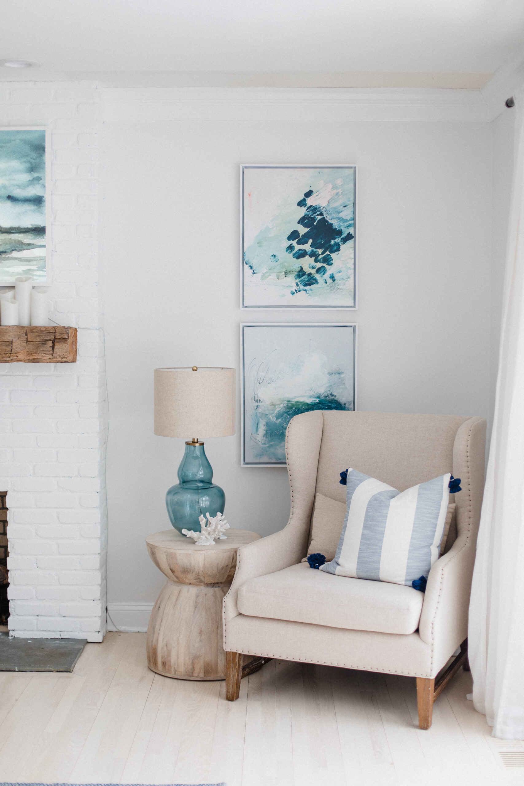 Connecticut life and style blogger Lauren McBride shares the coastal artwork in her modern coastal inspired home.