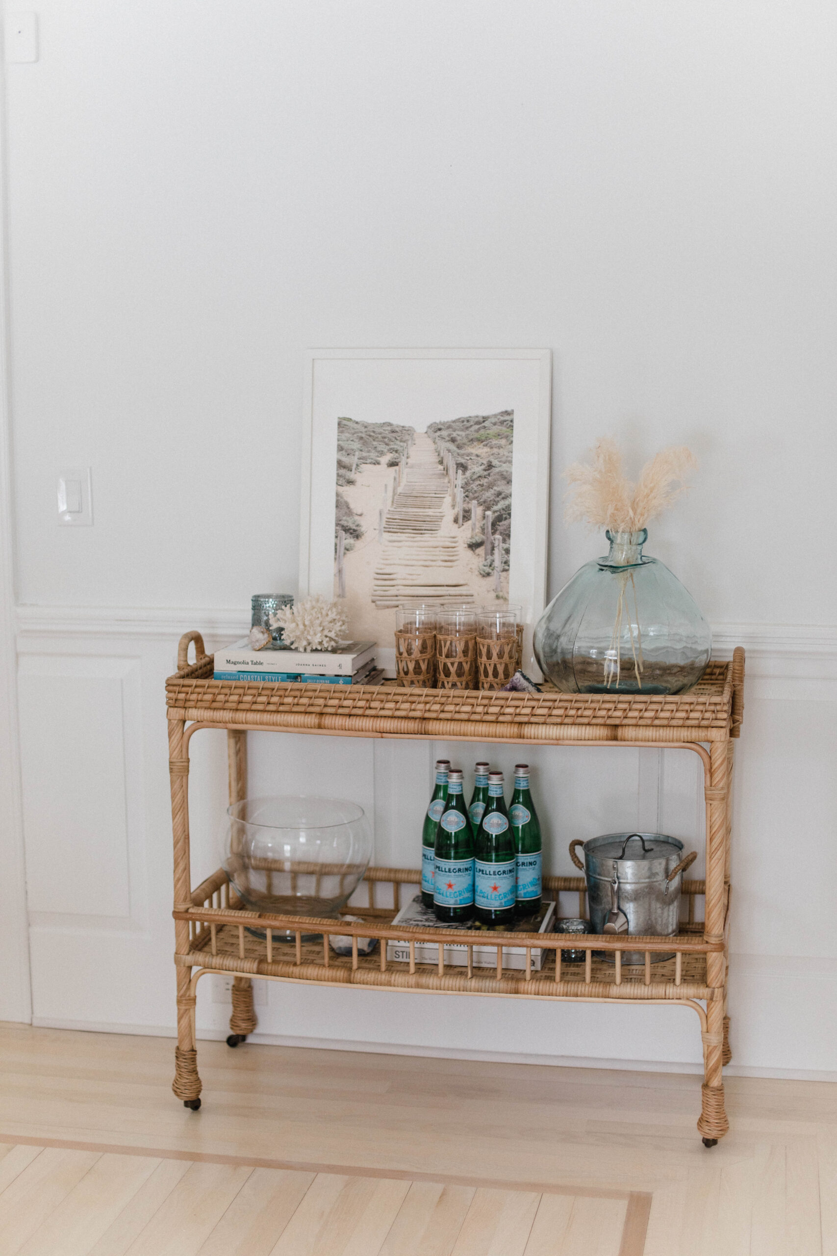 Connecticut life and style blogger Lauren McBride shares the coastal artwork in her modern coastal inspired home.