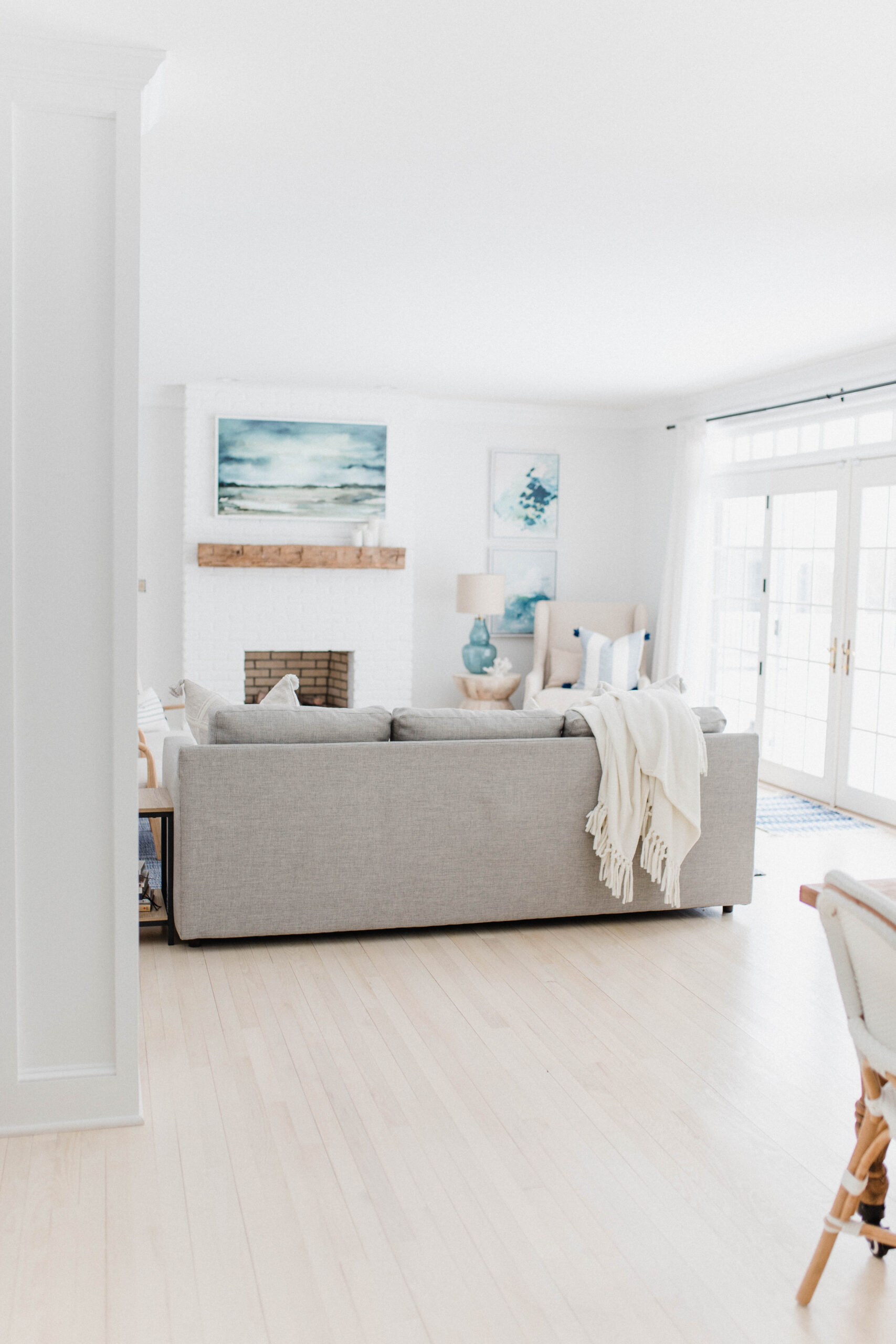 Connecticut life and style blogger Lauren McBride shares the process for bleaching and staining light, coastal-inspired wood flooring. 