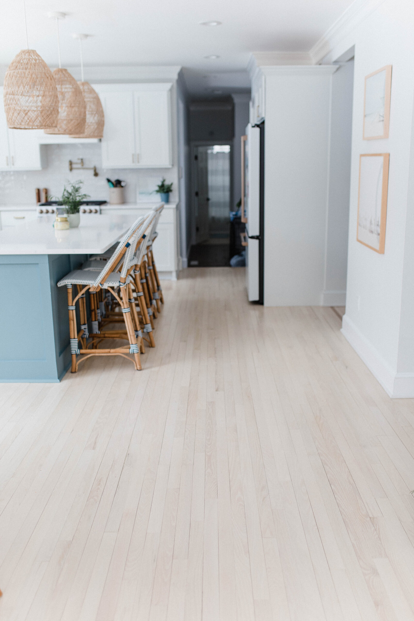 Connecticut life and style blogger Lauren McBride shares the process for bleaching and staining light, coastal-inspired wood flooring. 