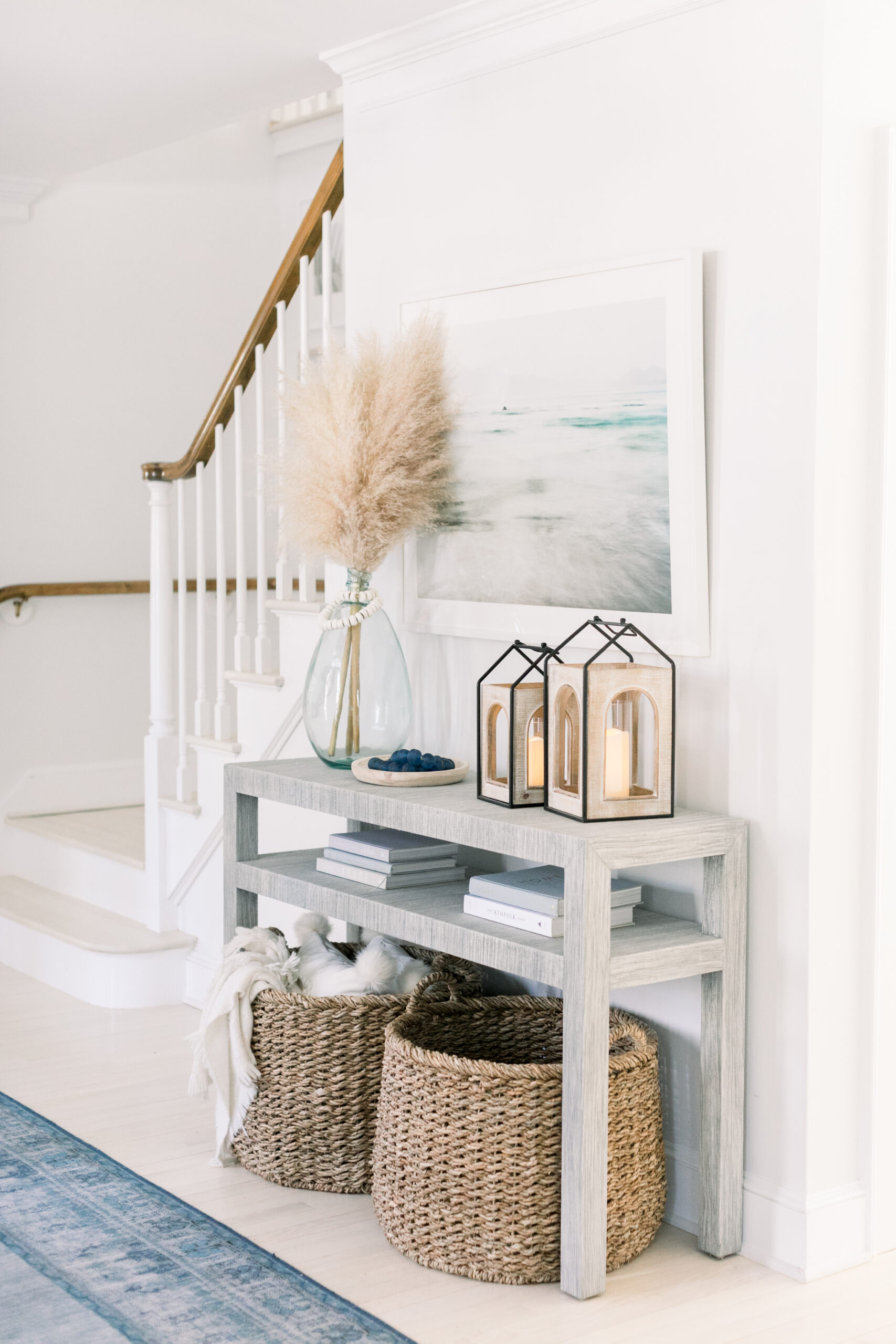 Connecticut life and style blogger Lauren McBride shares the coastal artwork in her modern coastal inspired home.