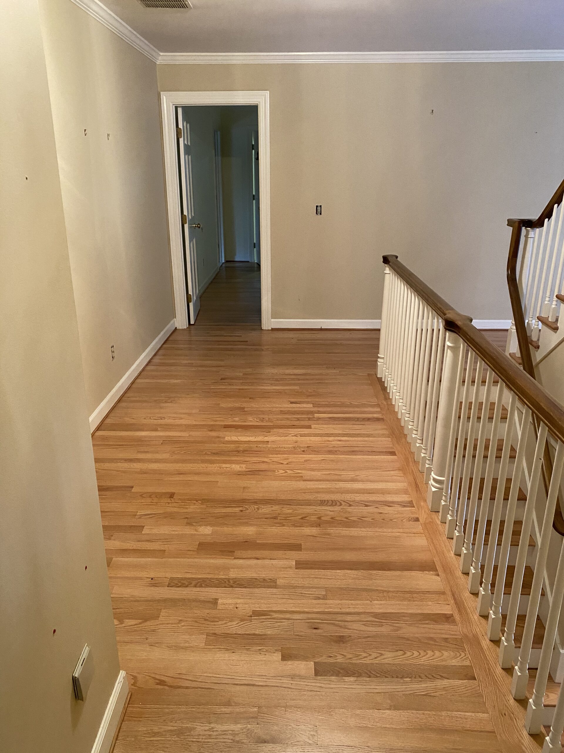 Connecticut life and style blogger Lauren McBride shares the process for bleaching and staining light, coastal-inspired wood flooring. 