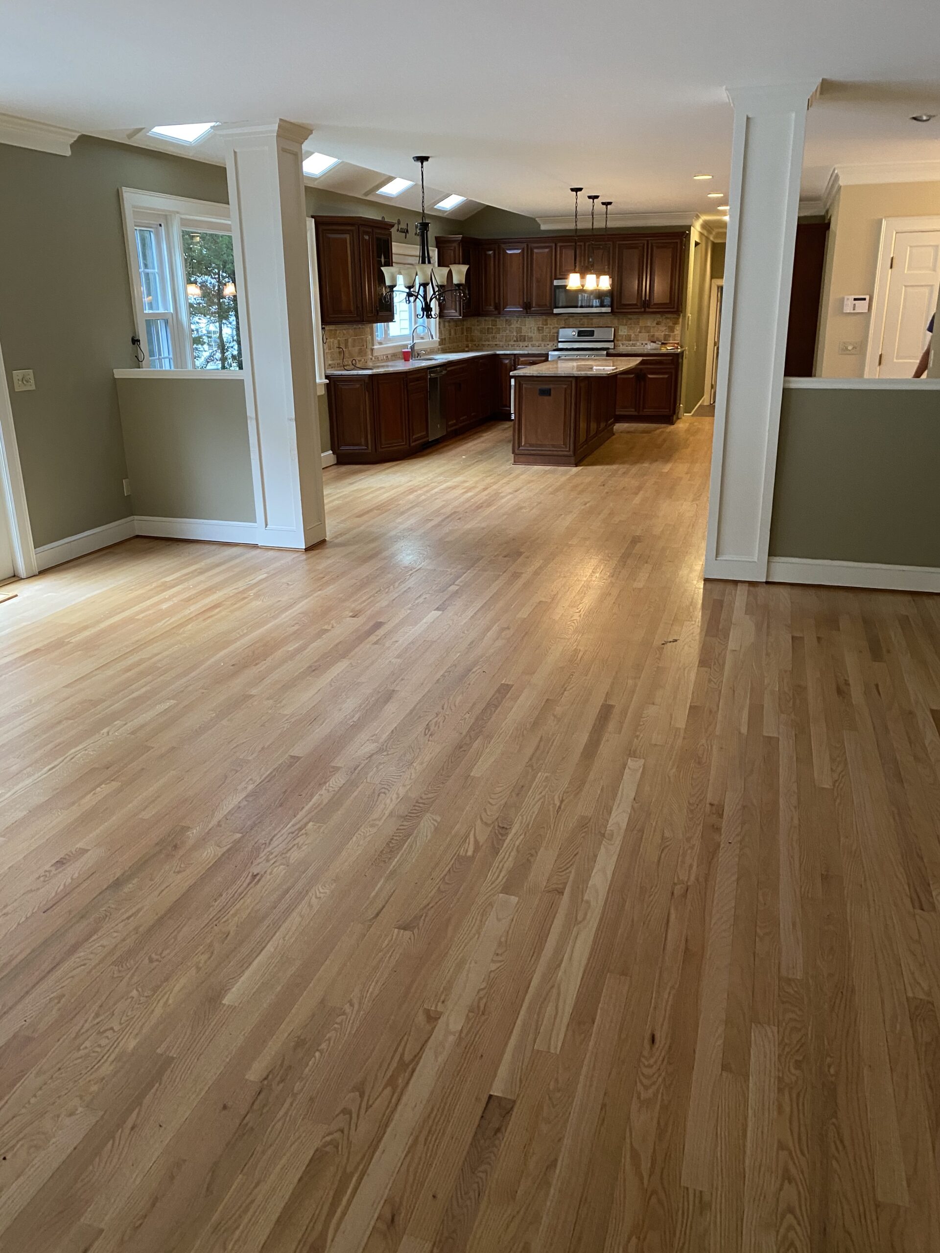 Connecticut life and style blogger Lauren McBride shares the process for bleaching and staining light, coastal-inspired wood flooring. 