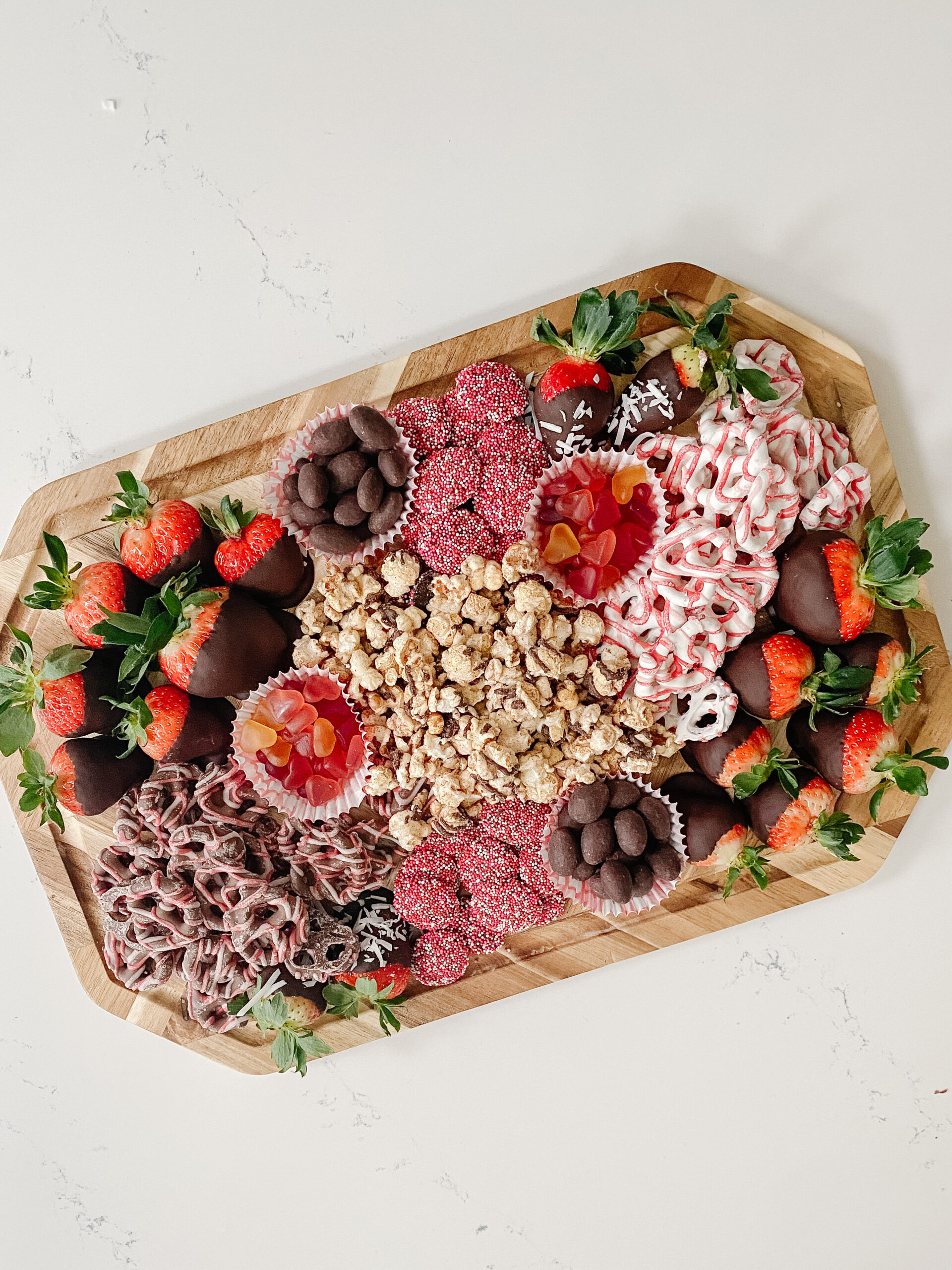 Connecticut life and style blogger Lauren McBride shares a Valentine's Day Charcuterie board include chocolate covered strawberry recipe.