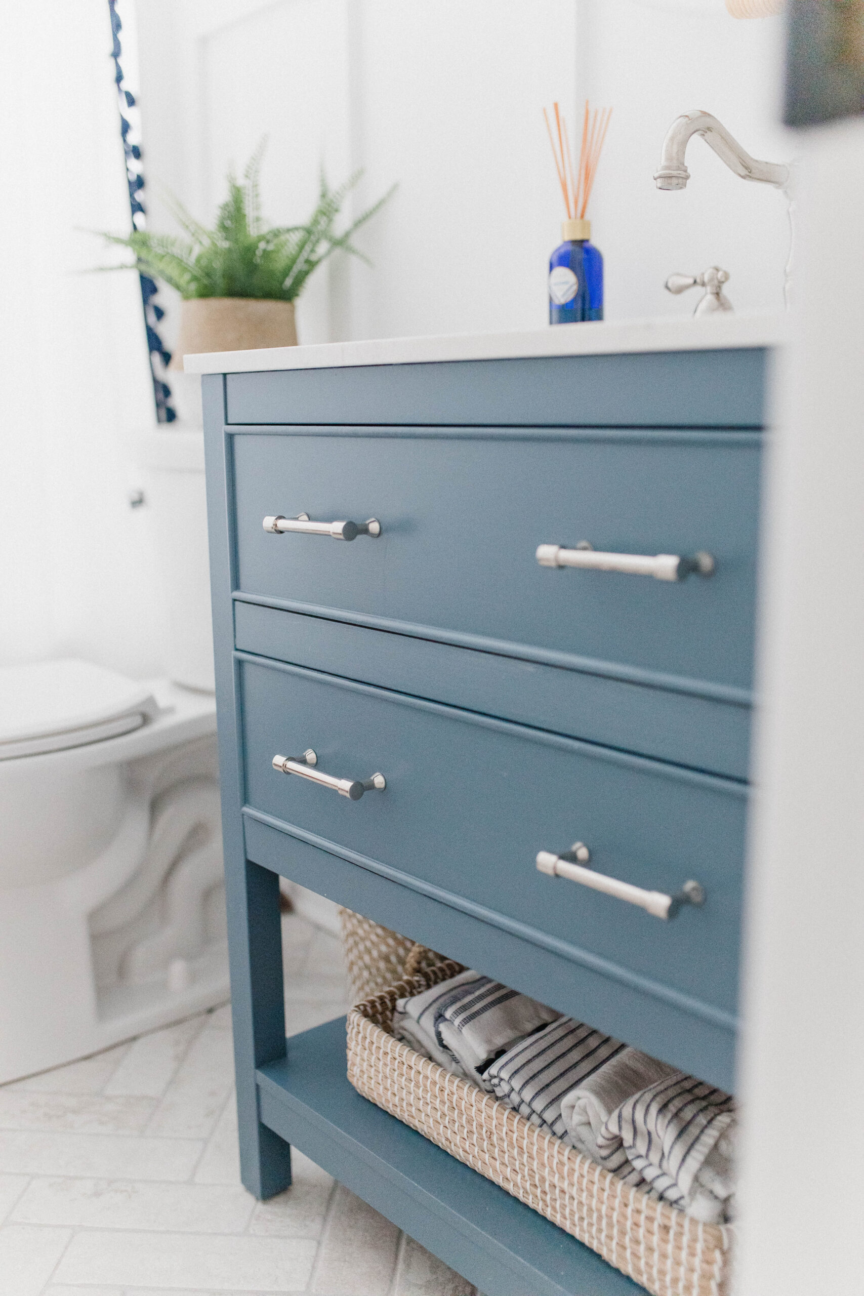 Connecticut life and style blogger Lauren McBride shares her coastal bathroom update, featuring accessories from Serena & Lily.
