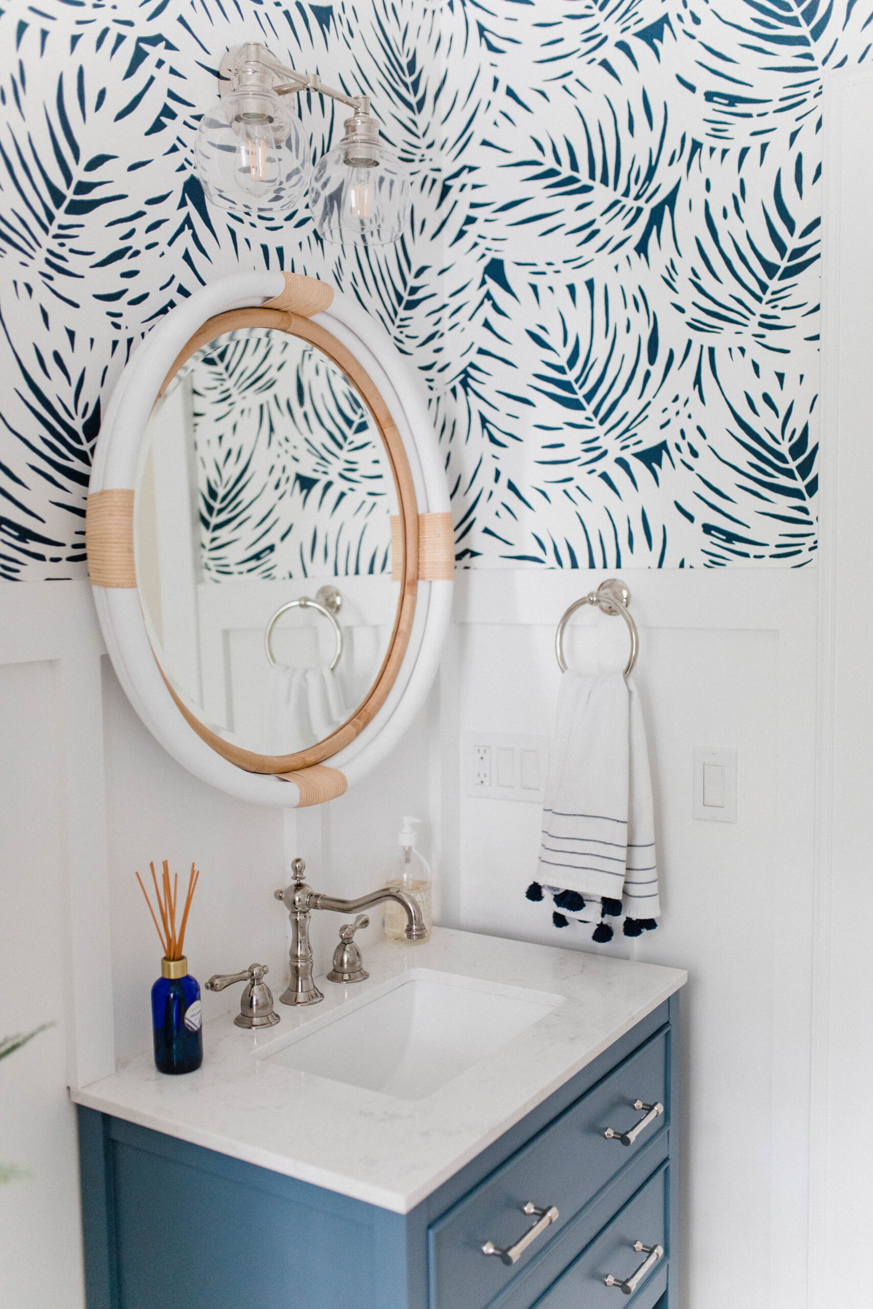 Connecticut life and style blogger Lauren McBride shares her modern coastal mudroom and bathroom makeover including sources.