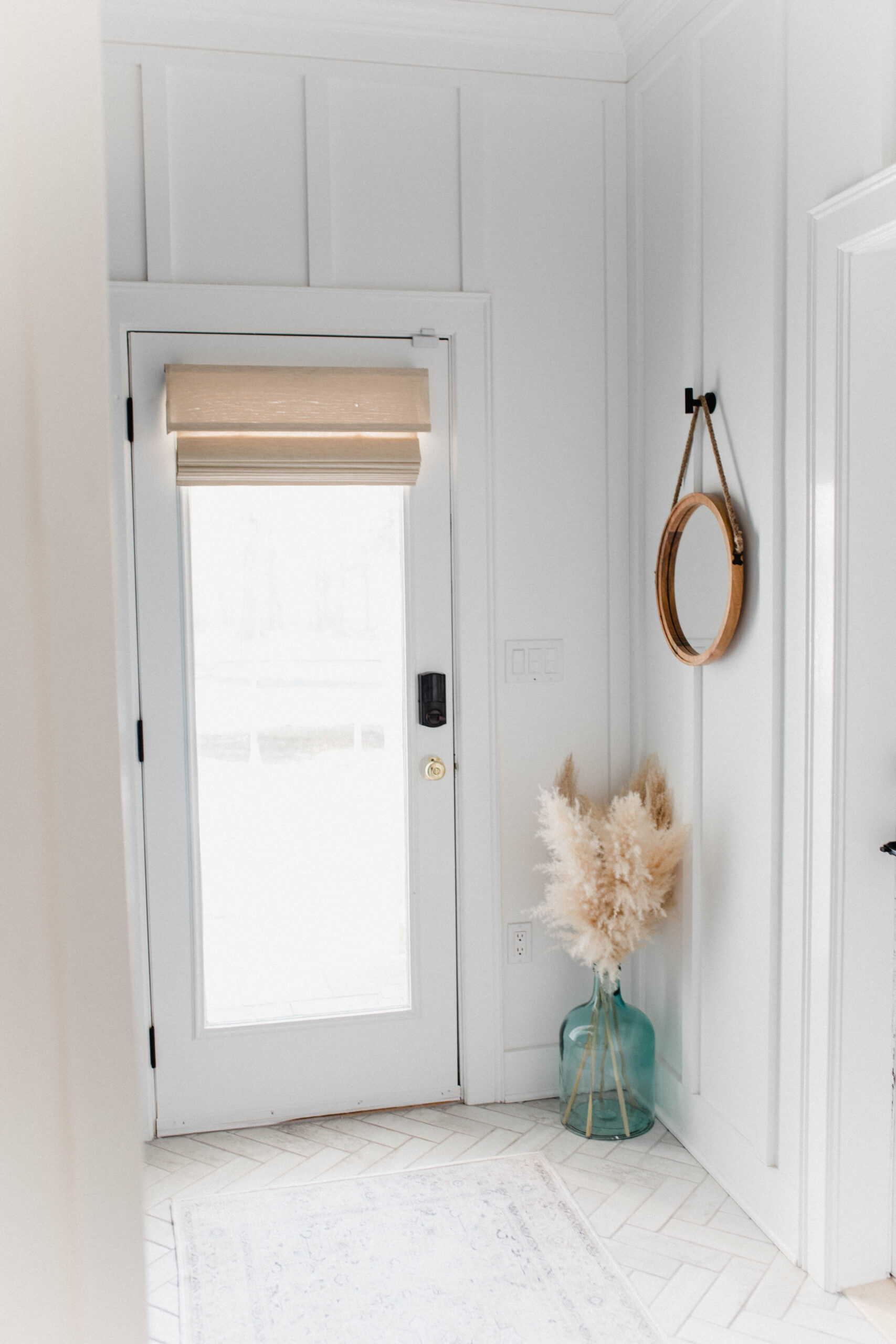 Connecticut life and style blogger Lauren McBride shares her modern coastal mudroom and bathroom makeover including sources.