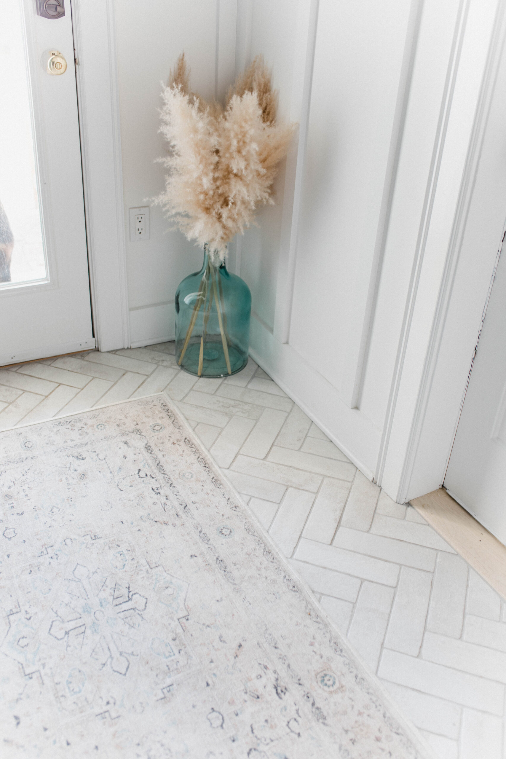 Connecticut life and style blogger Lauren McBride shares her modern coastal mudroom and bathroom makeover including sources.