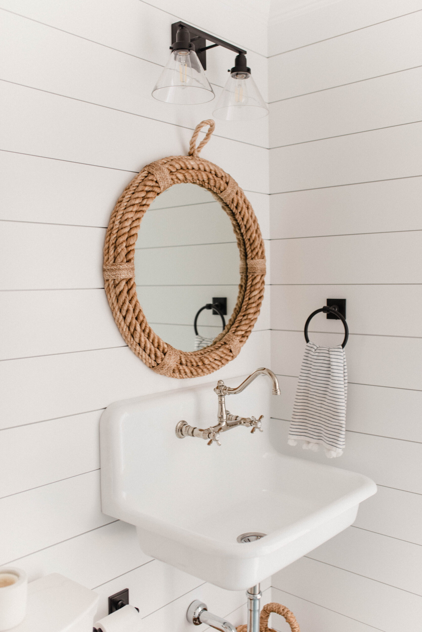 Connecticut life and style blogger Lauren McBride shares her modern coastal laundry room decor from Serena and Lily.